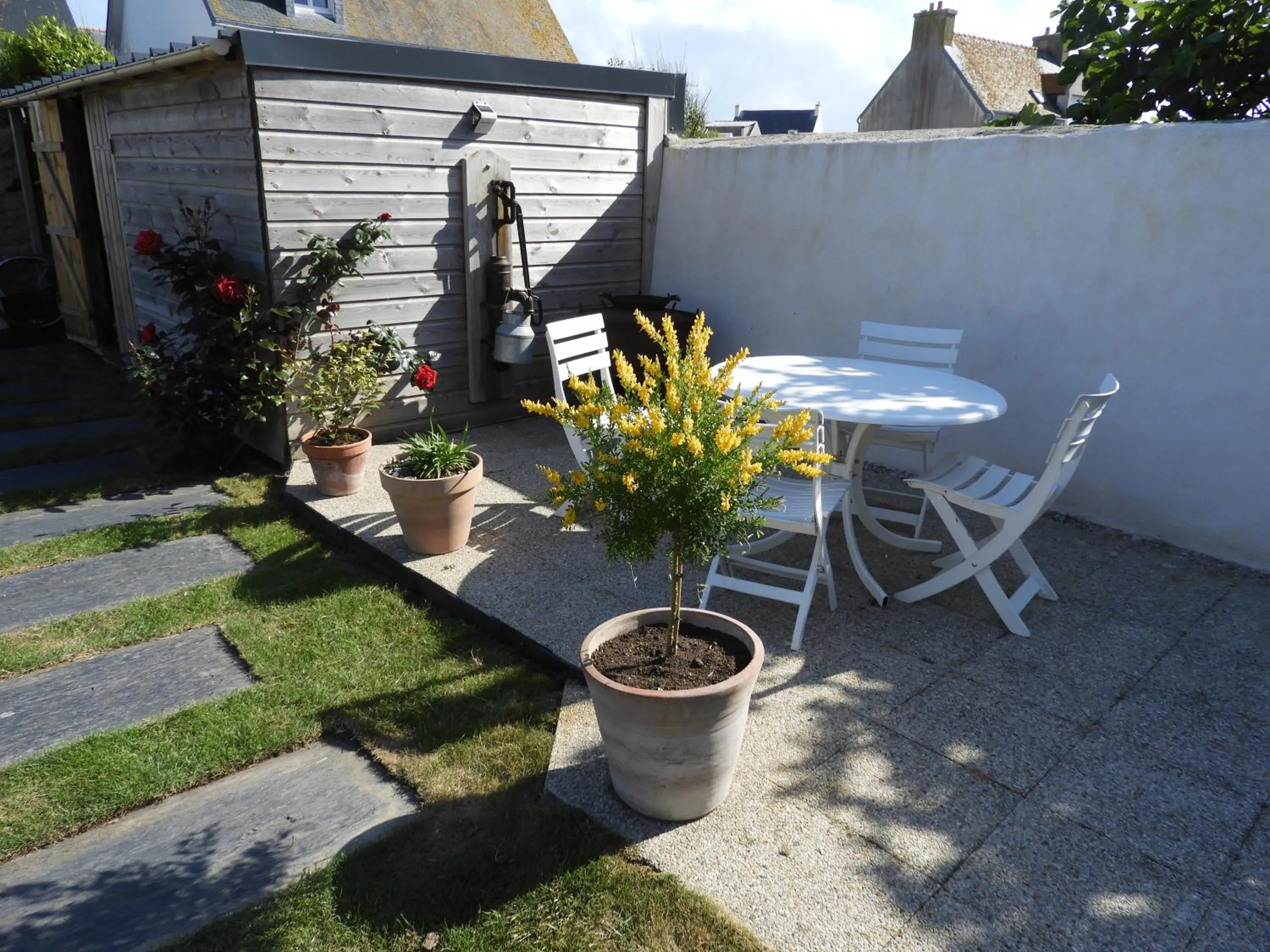 Patio in les volets bleus