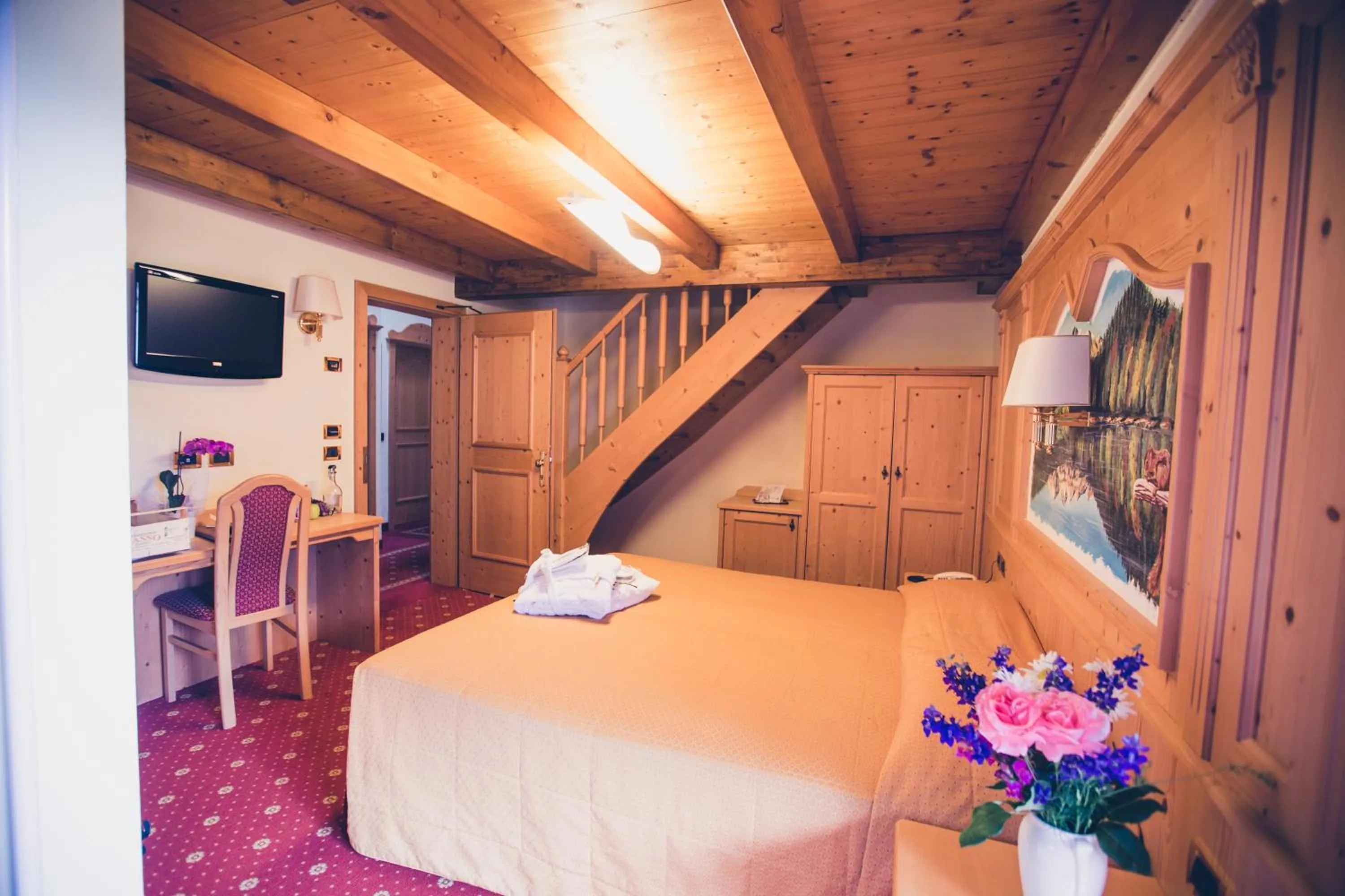 Photo of the whole room, Bed in Albergo Dimaro Wellness Hotel