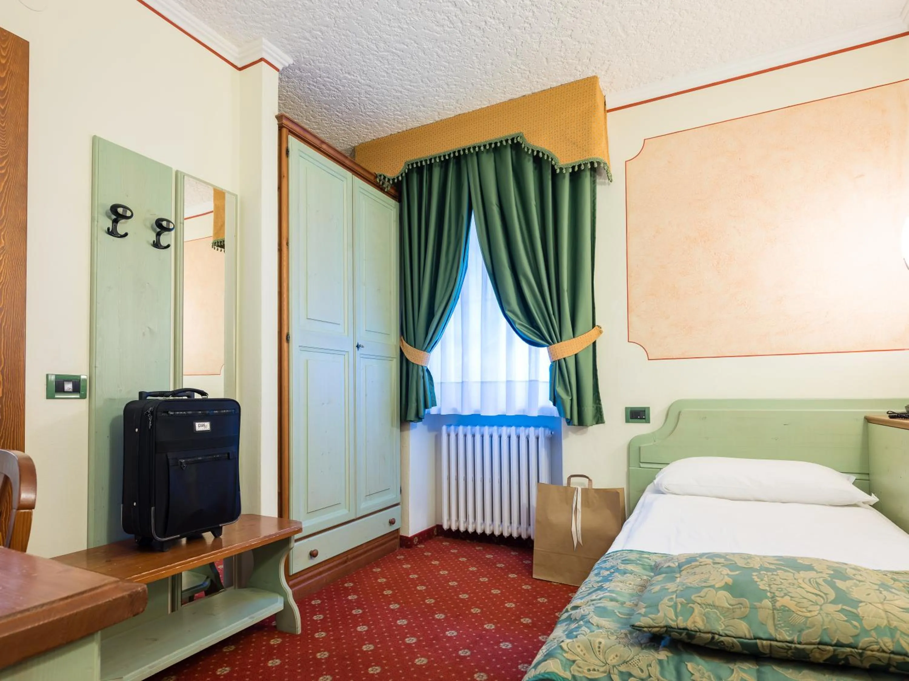 Bedroom, Bed in Albergo Dimaro Wellness Hotel