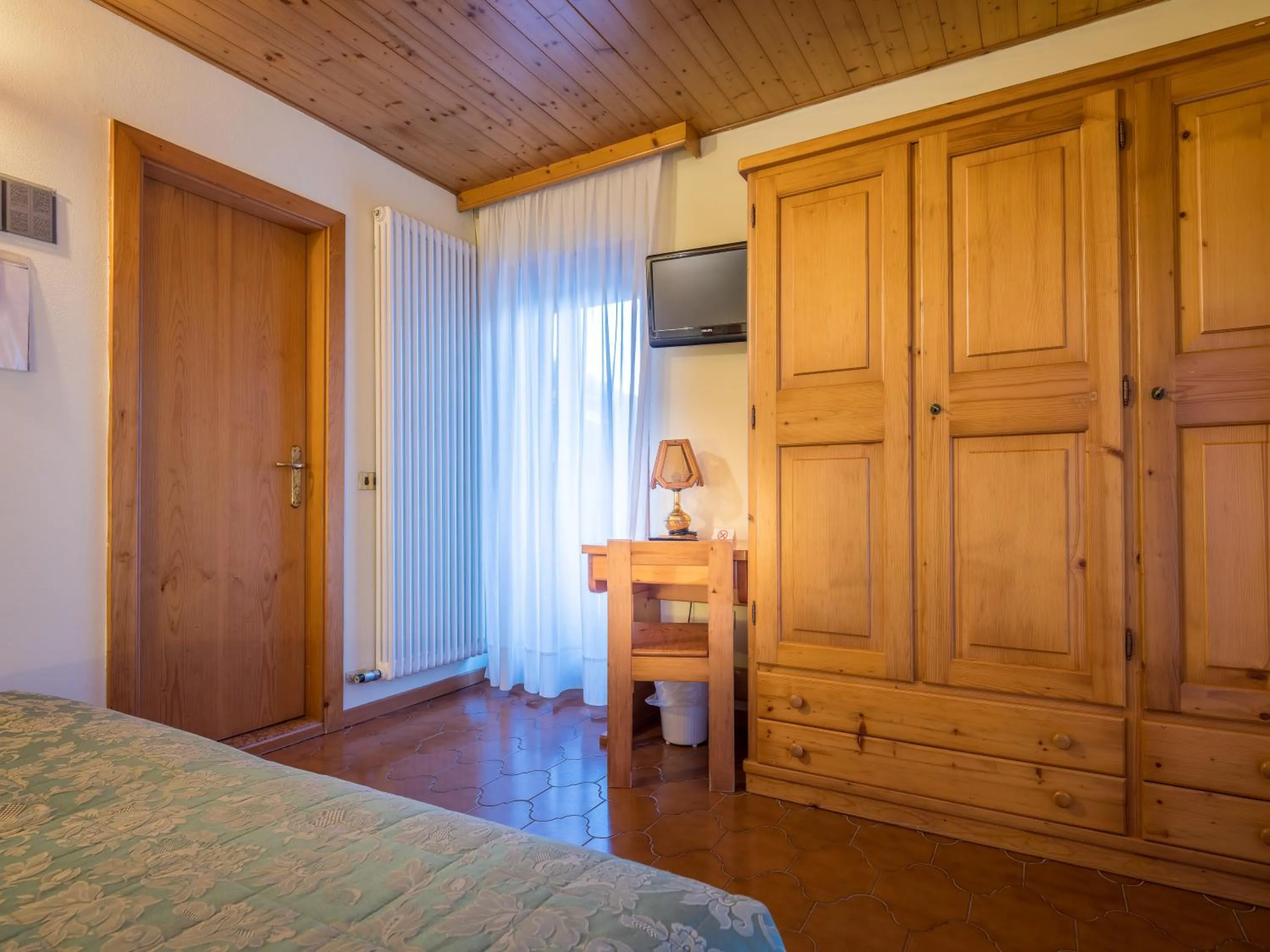 Bedroom, Bed in Albergo Dimaro Wellness Hotel