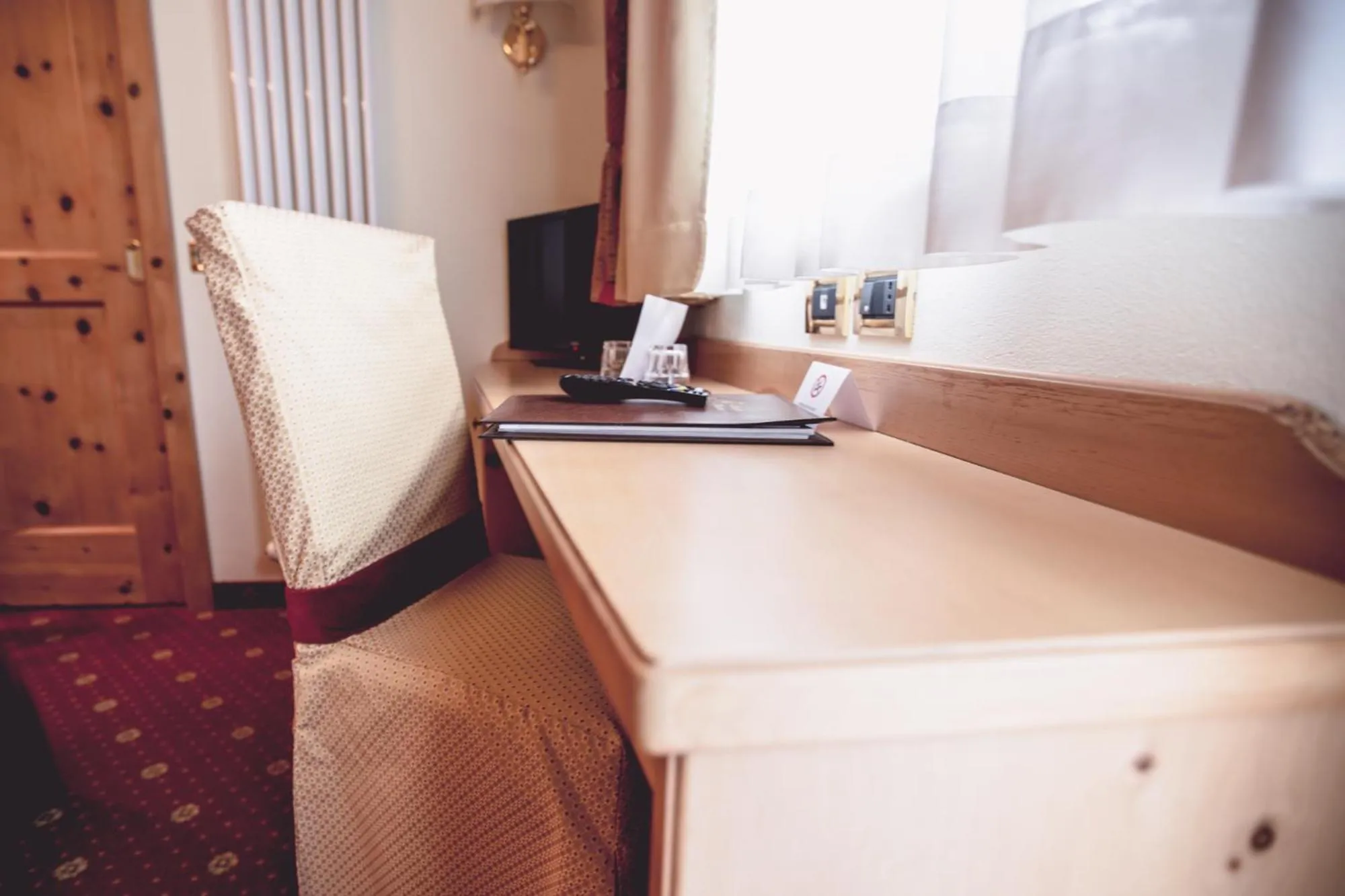 Decorative detail, Bed in Albergo Dimaro Wellness Hotel