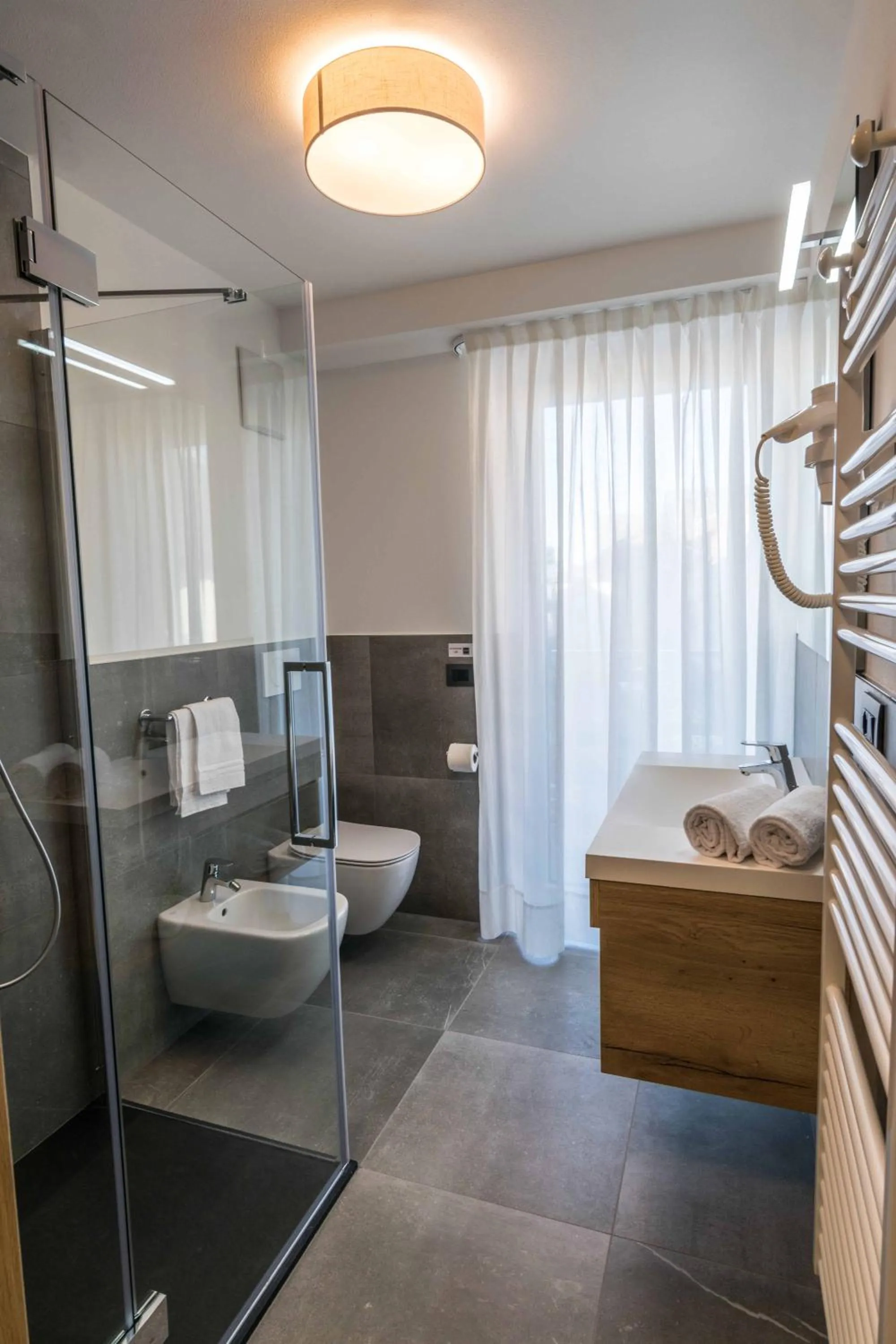 Shower in Albergo Dimaro Wellness Hotel
