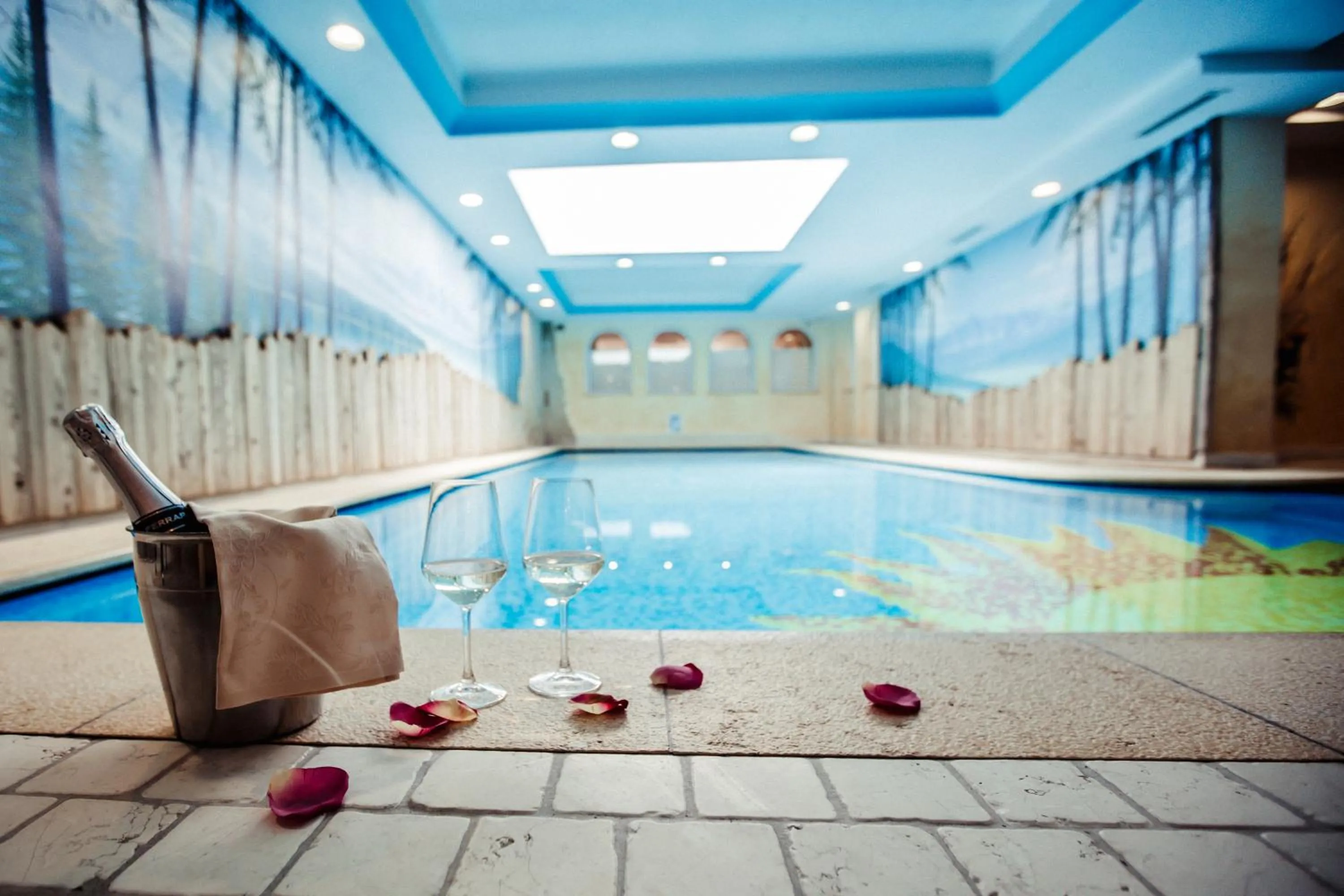 Swimming pool in Albergo Dimaro Wellness Hotel