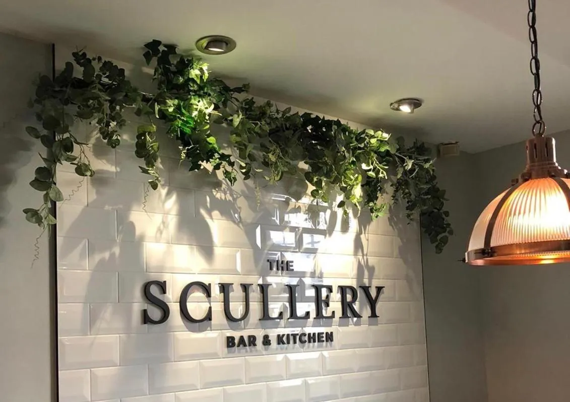 Property logo or sign in Newmachar Hotel