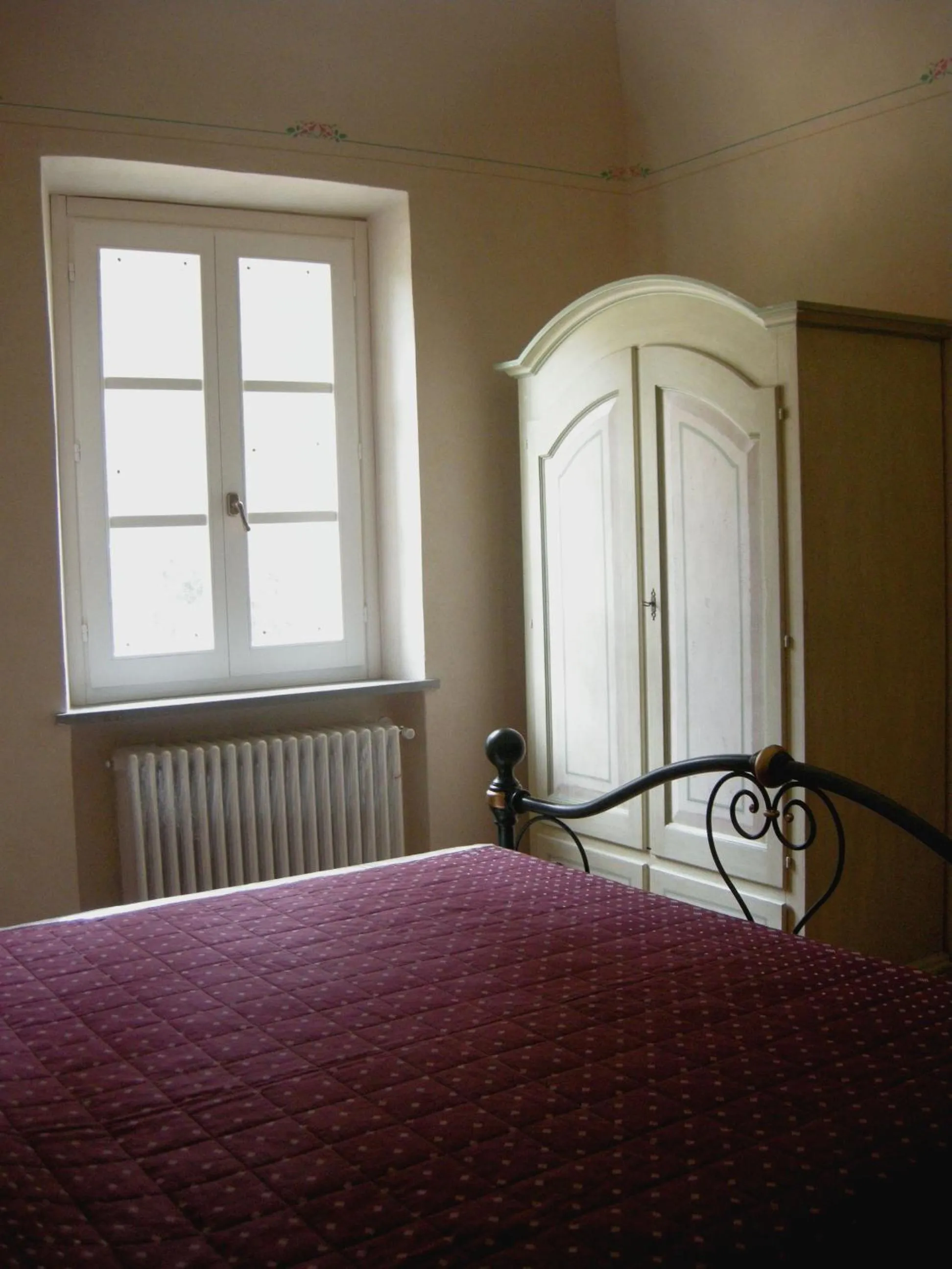 Decorative detail, Bed in Relais Villa Sensano