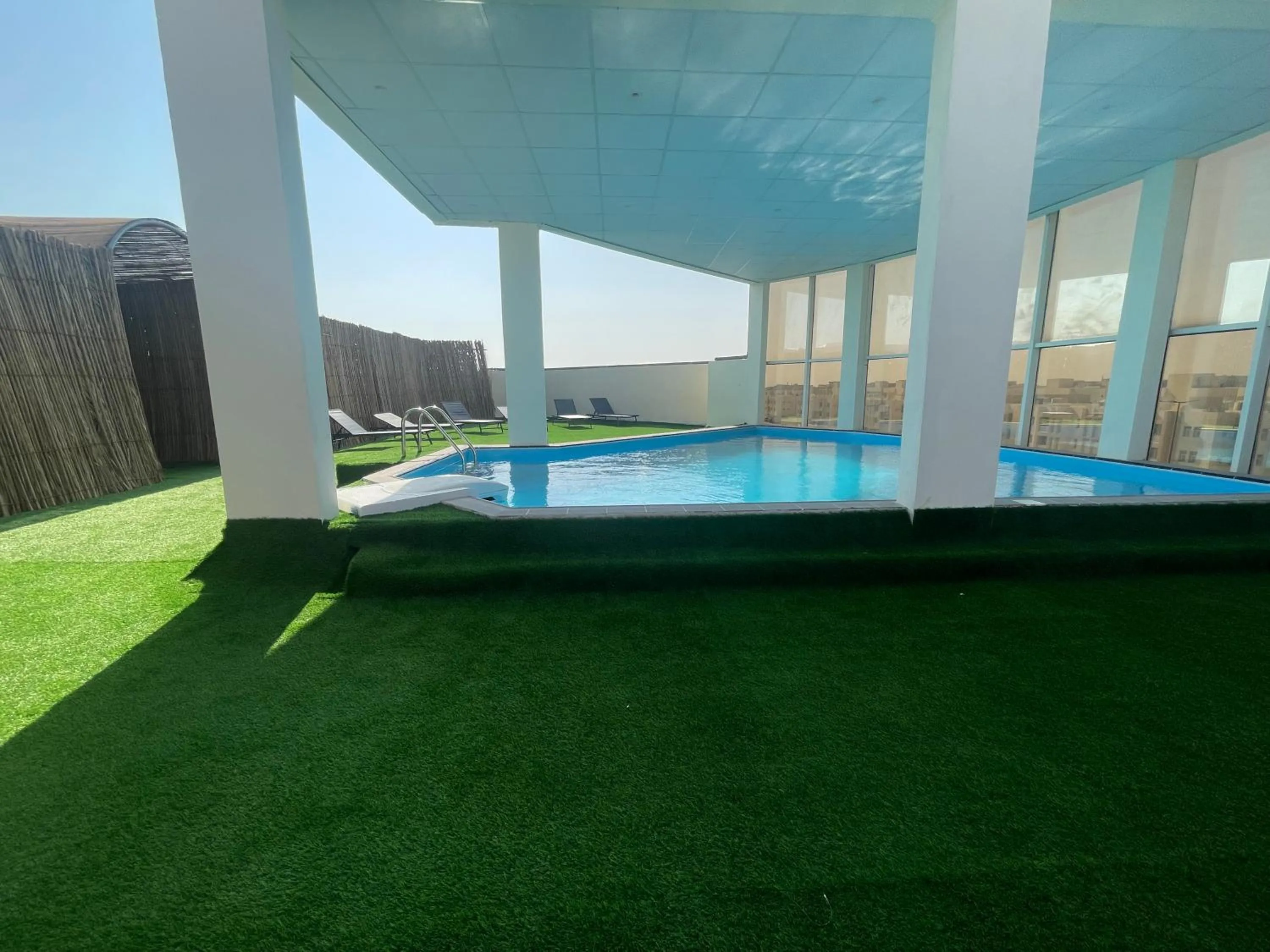 Swimming pool in Wakra Inn Hotel Apartments