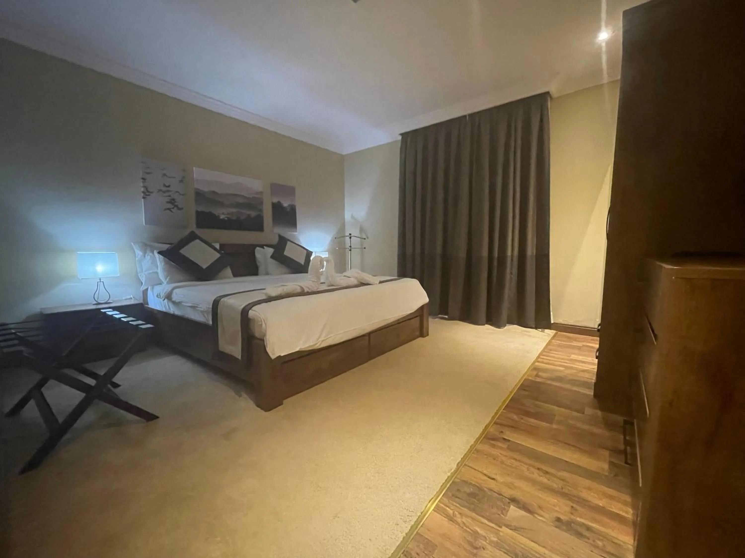 Bed in Wakra Inn Hotel Apartments