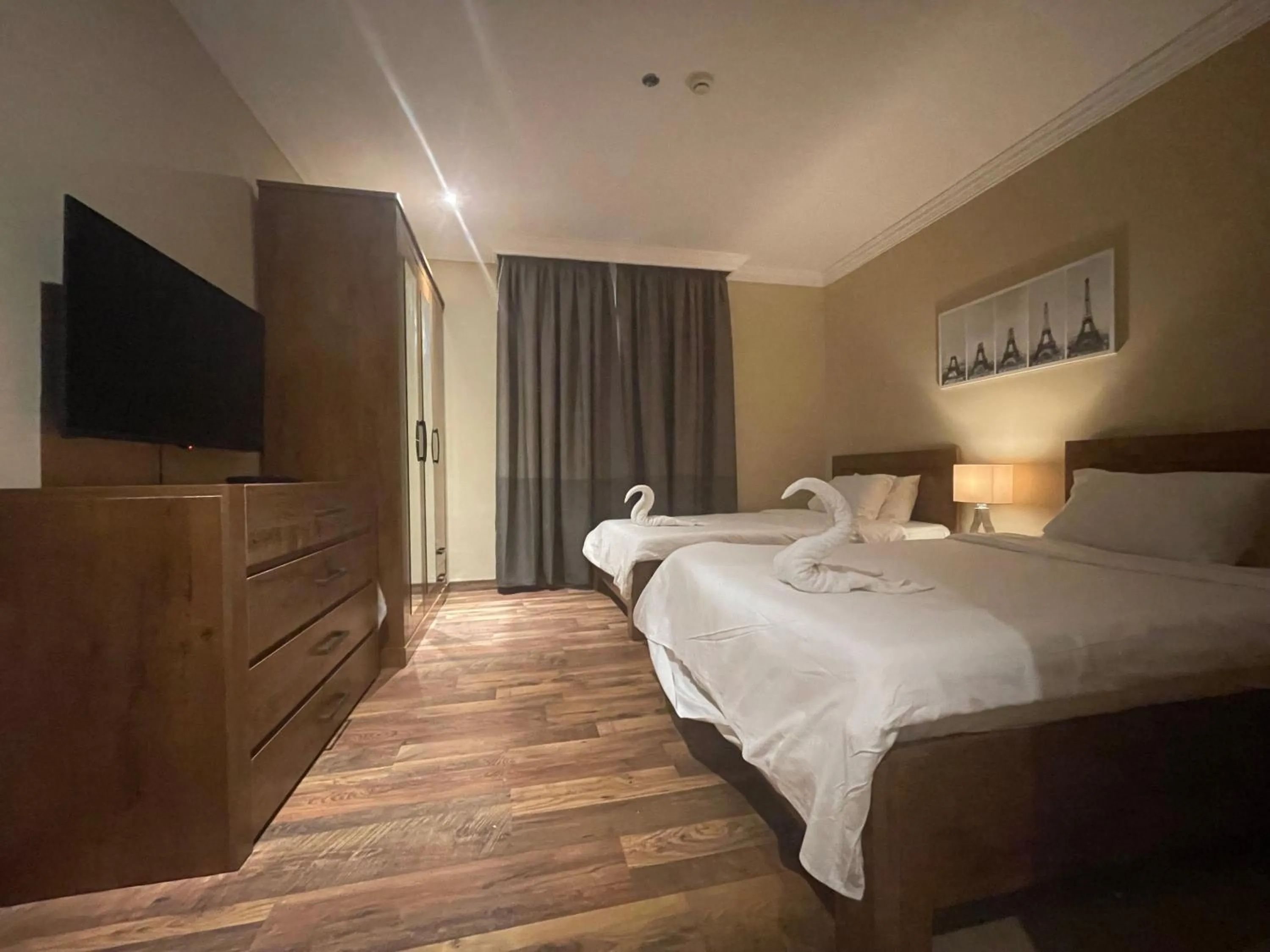 Bed in Wakra Inn Hotel Apartments