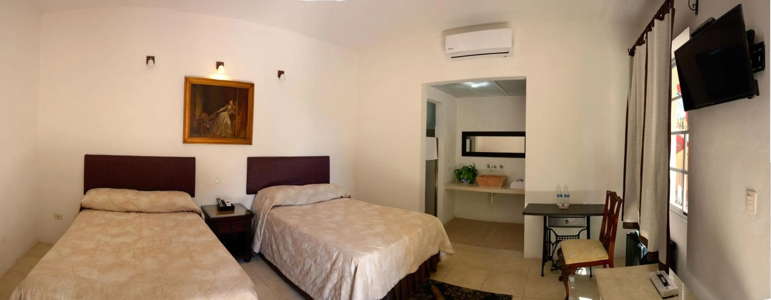 Bed in Hotel Mejorada Merida