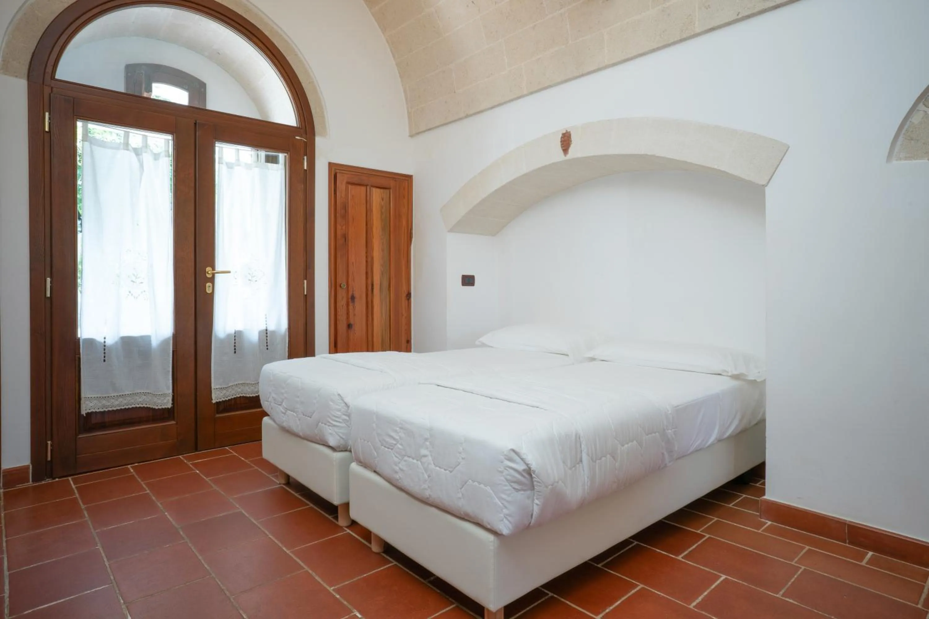 Bed in Masseria Le Lamie