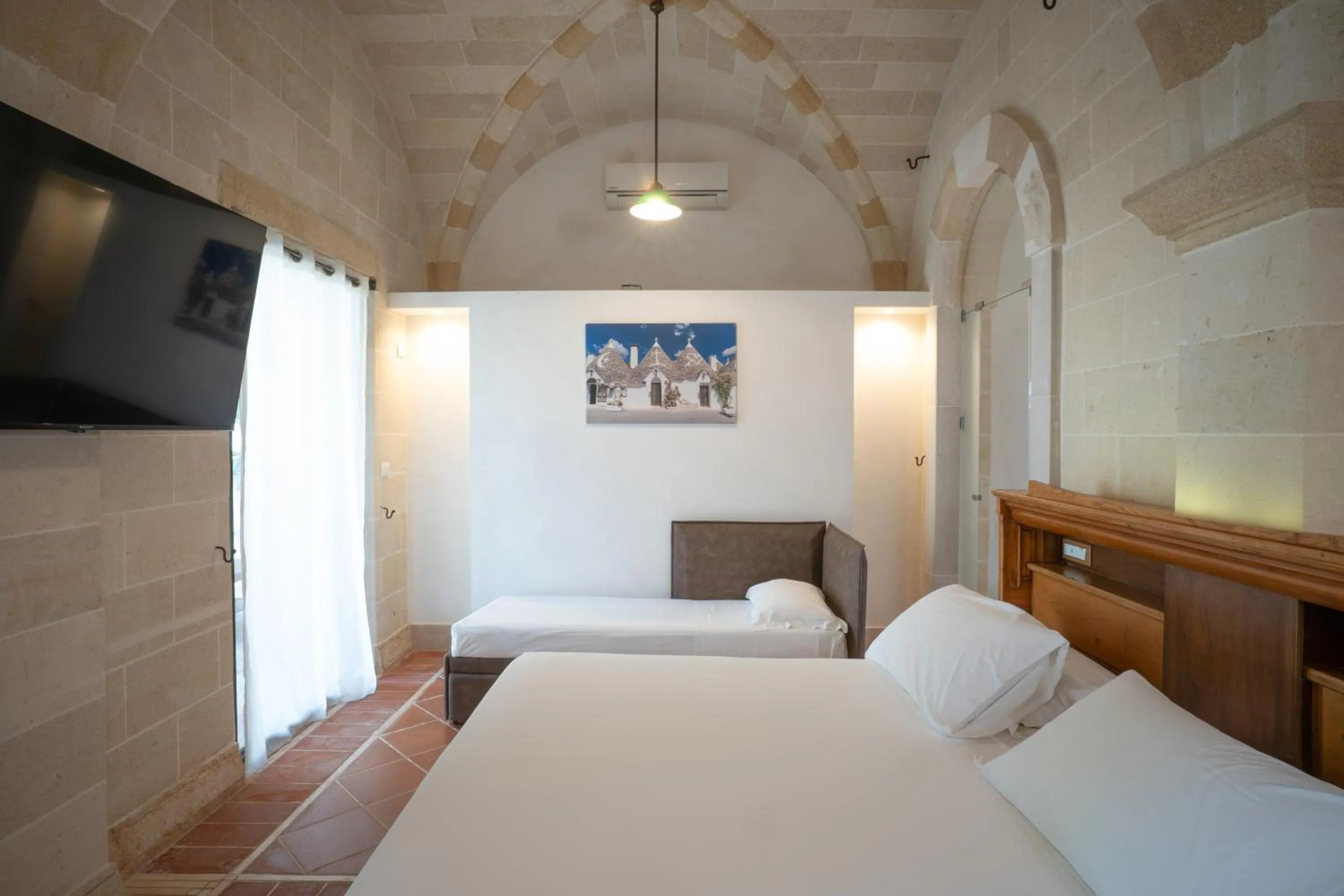 Bed in Masseria Le Lamie