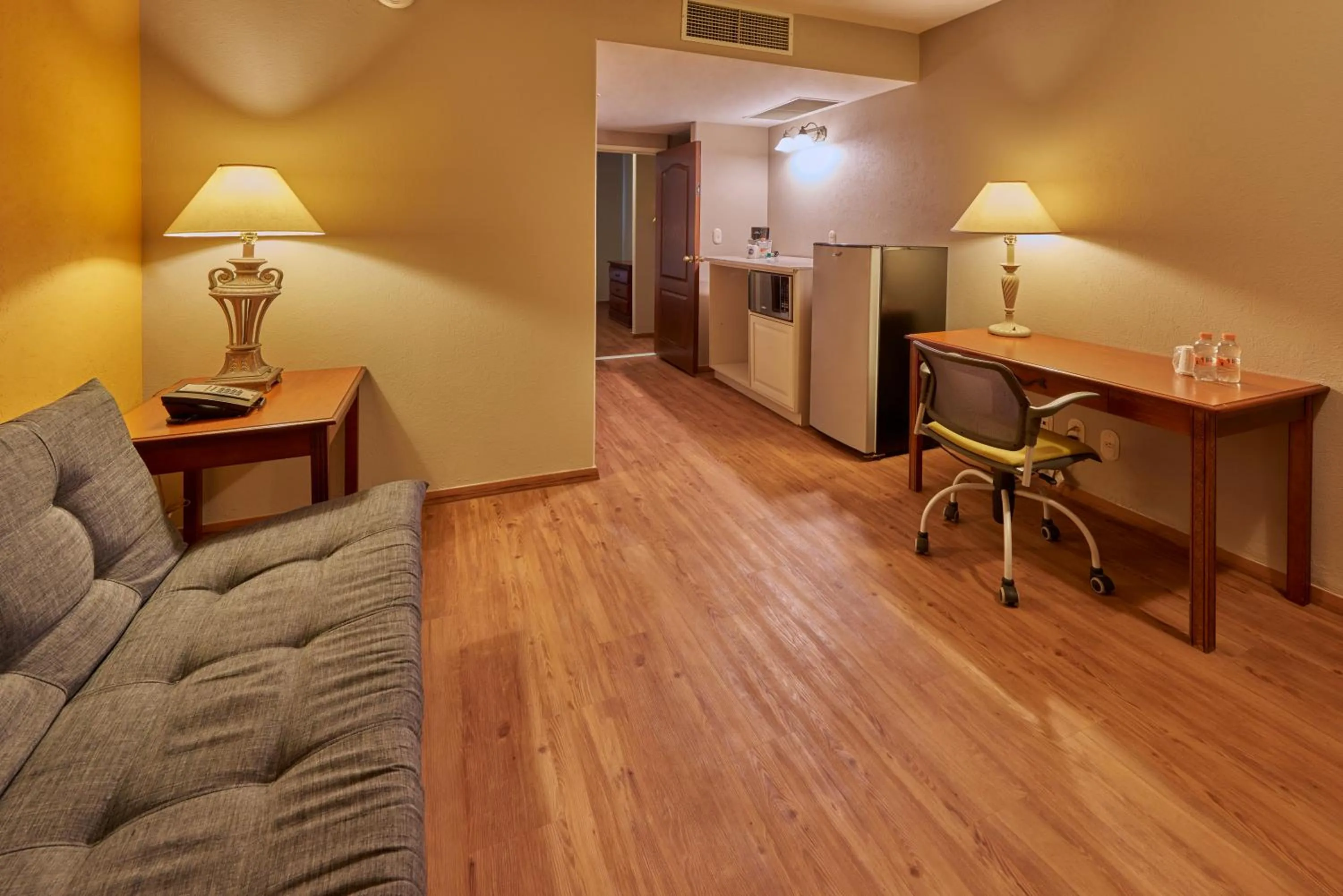 Living room in Sierra Suites By HP Hotels