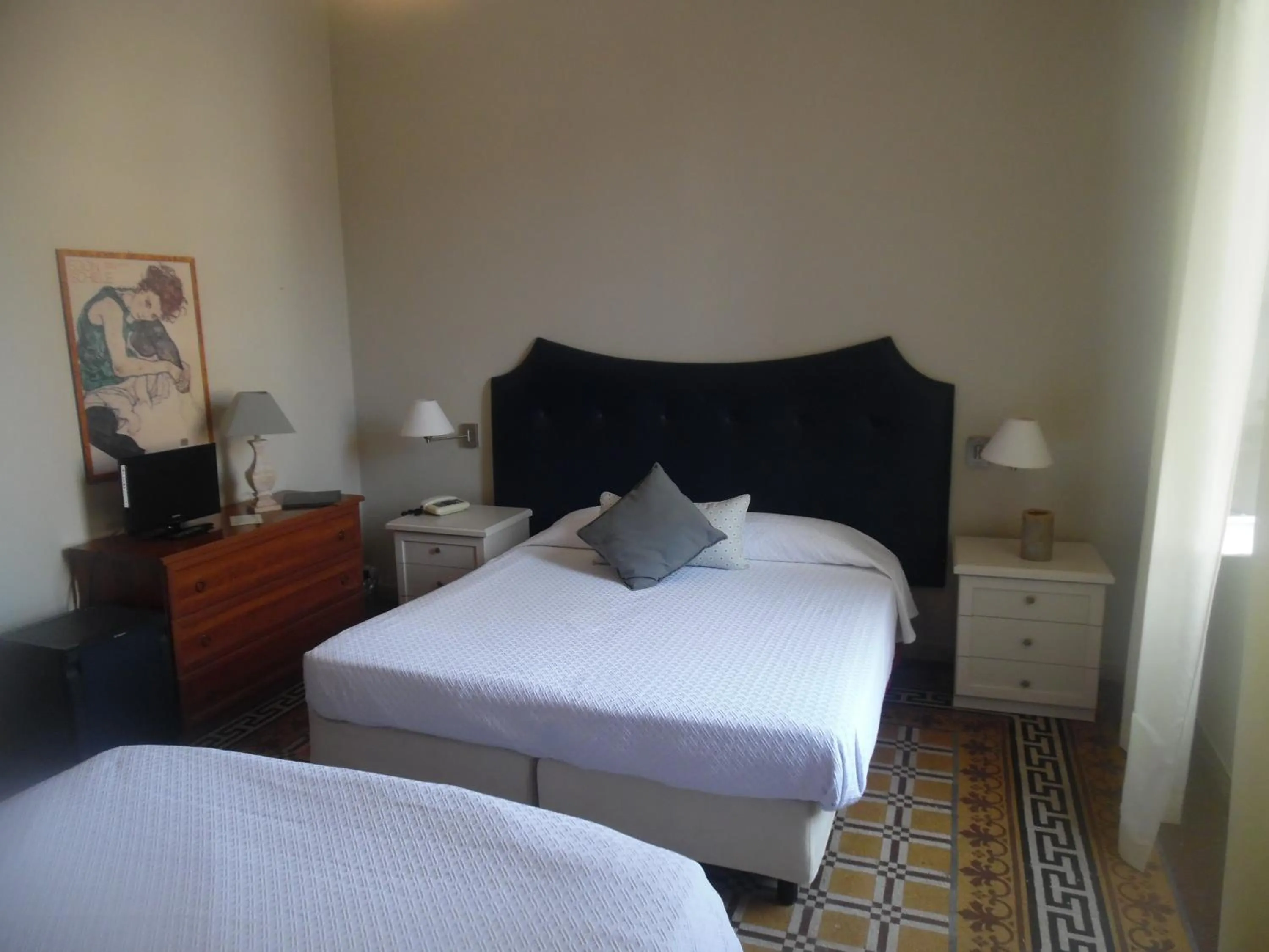 Bed in Hotel Miramare