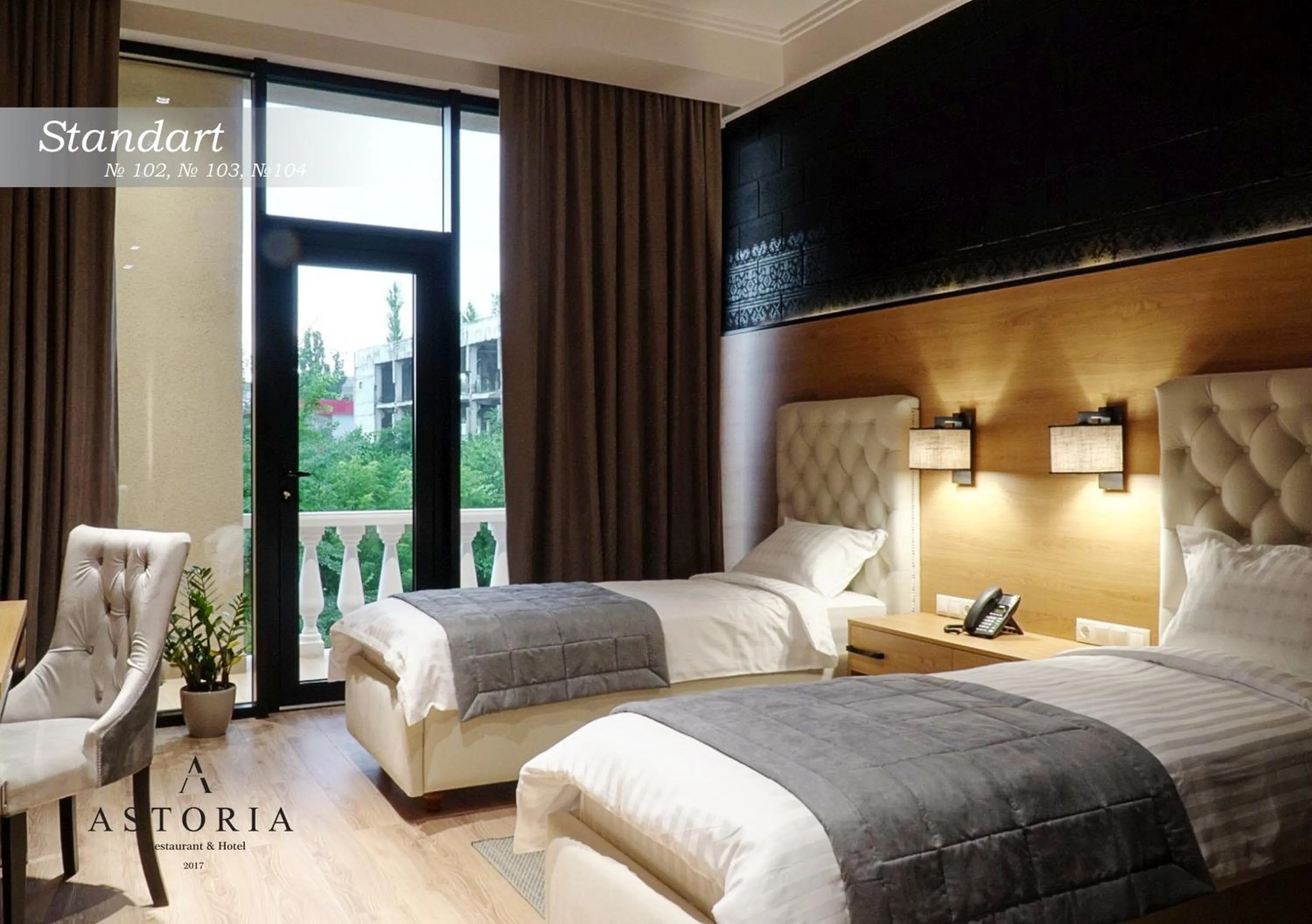 Bed in ASTORIA Boutique Hotel