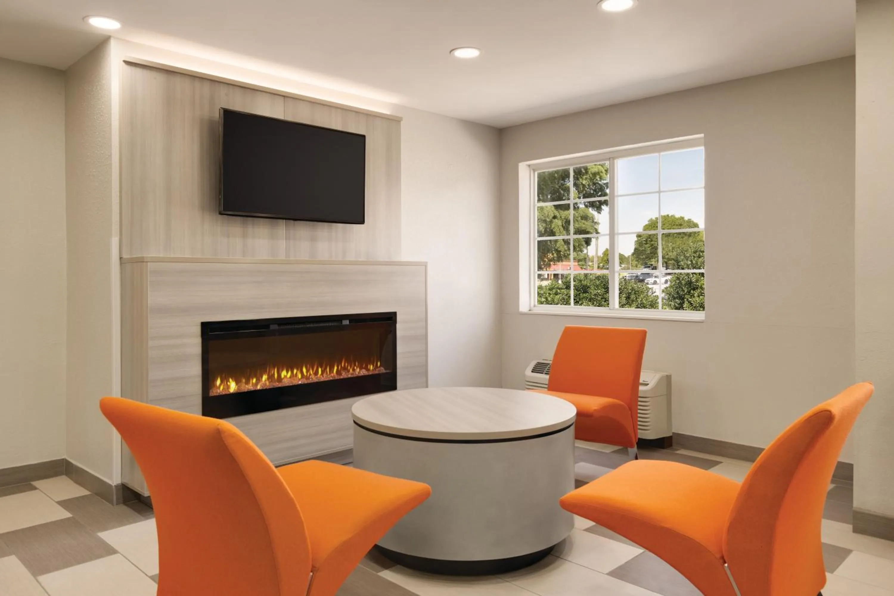 Seating area in Microtel Inn & Suites by Wyndham Raleigh