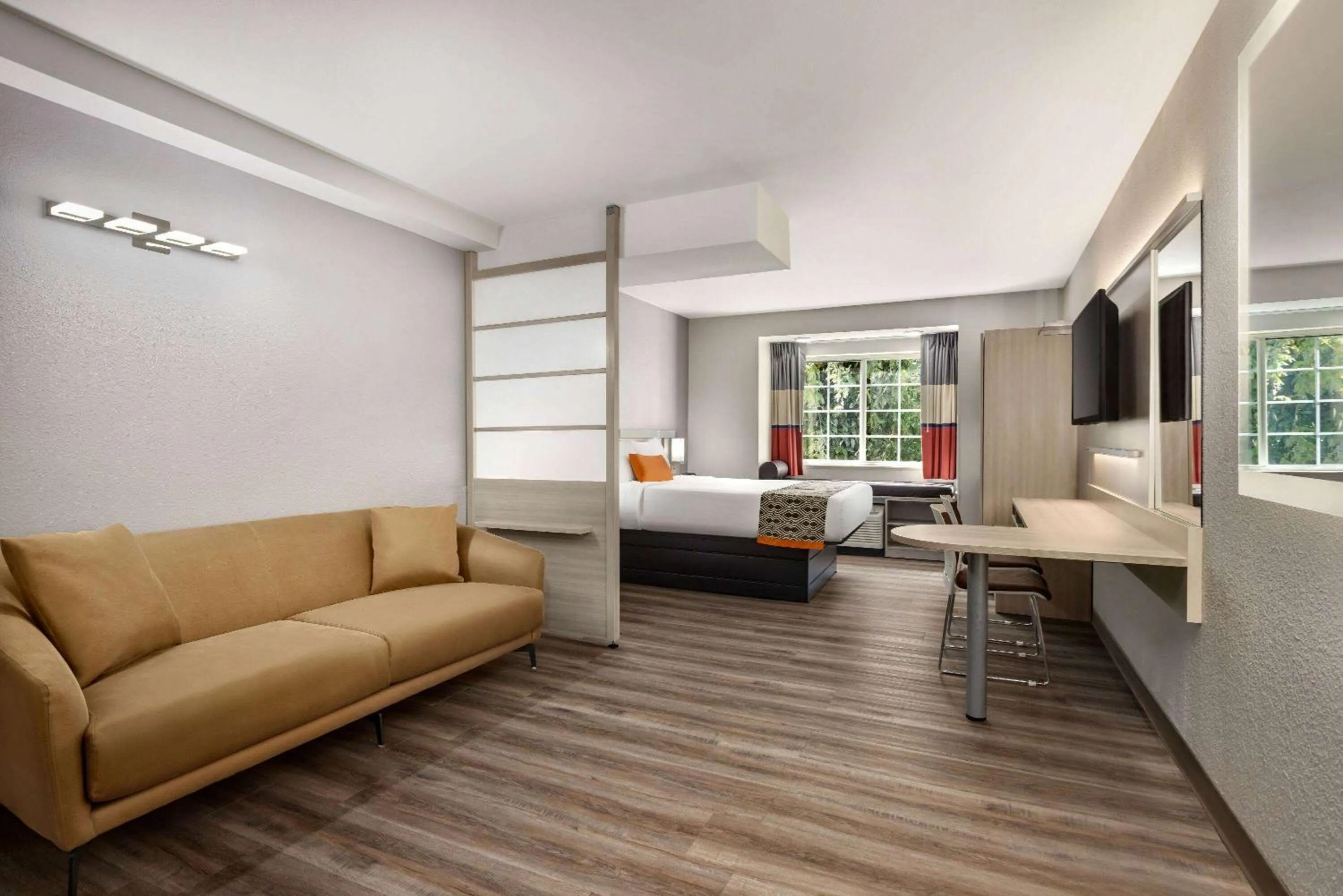 Bed in Microtel Inn & Suites by Wyndham Raleigh