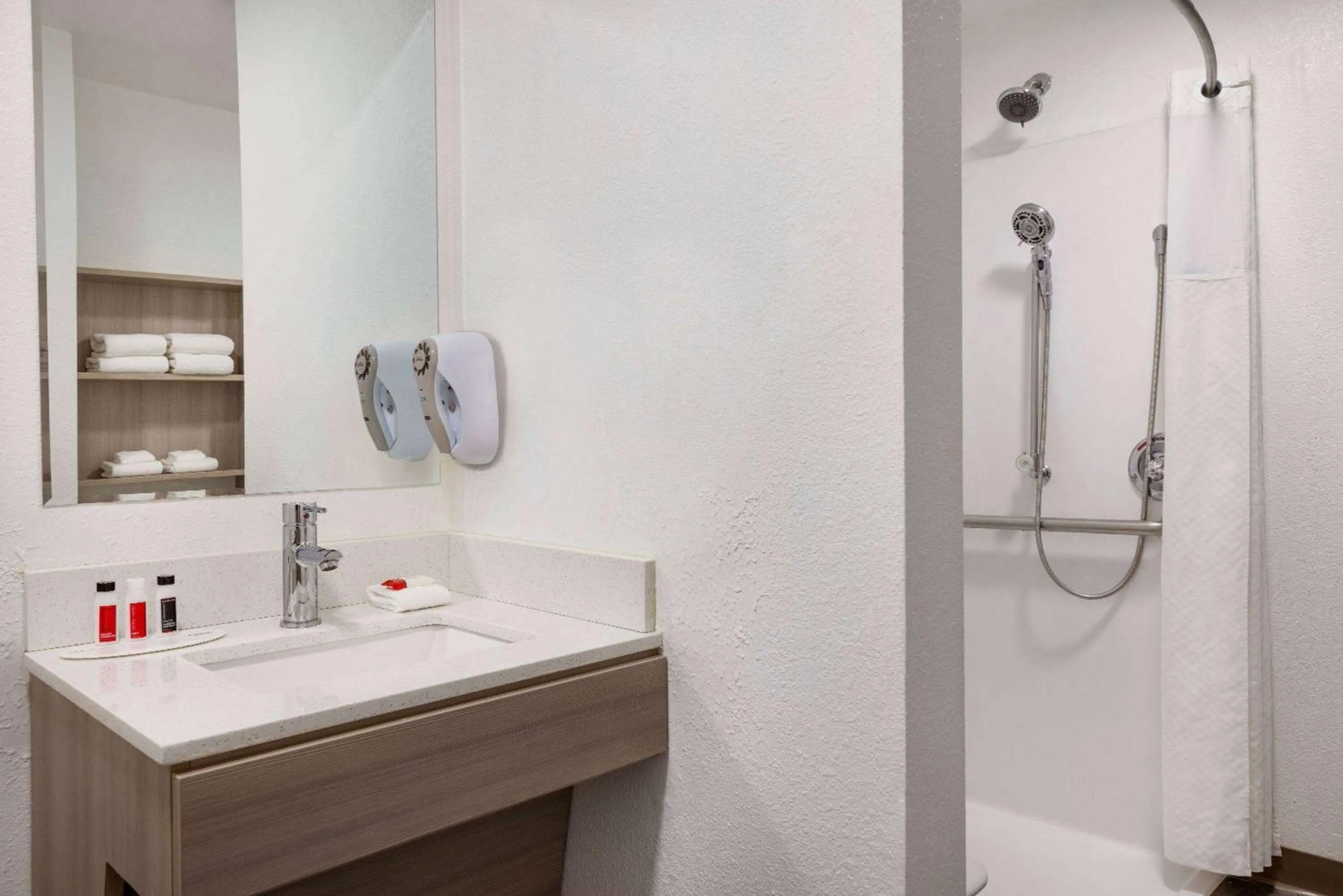 Shower in Microtel Inn & Suites by Wyndham Raleigh