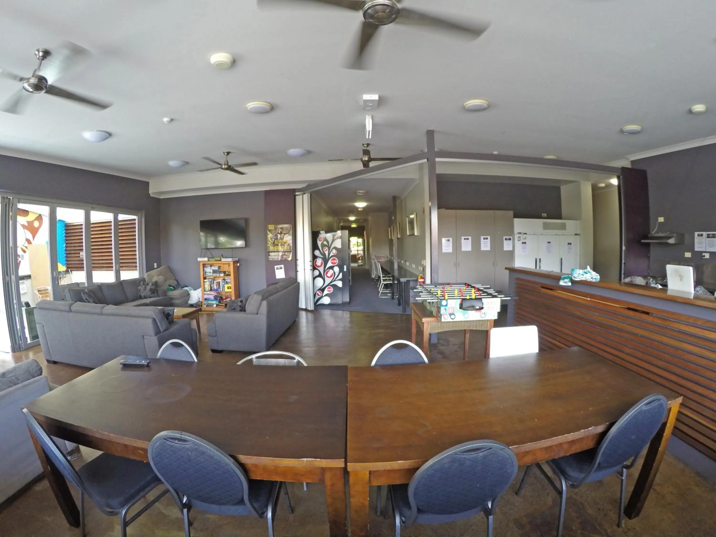 Communal lounge/ TV room in Global Backpackers Port Douglas
