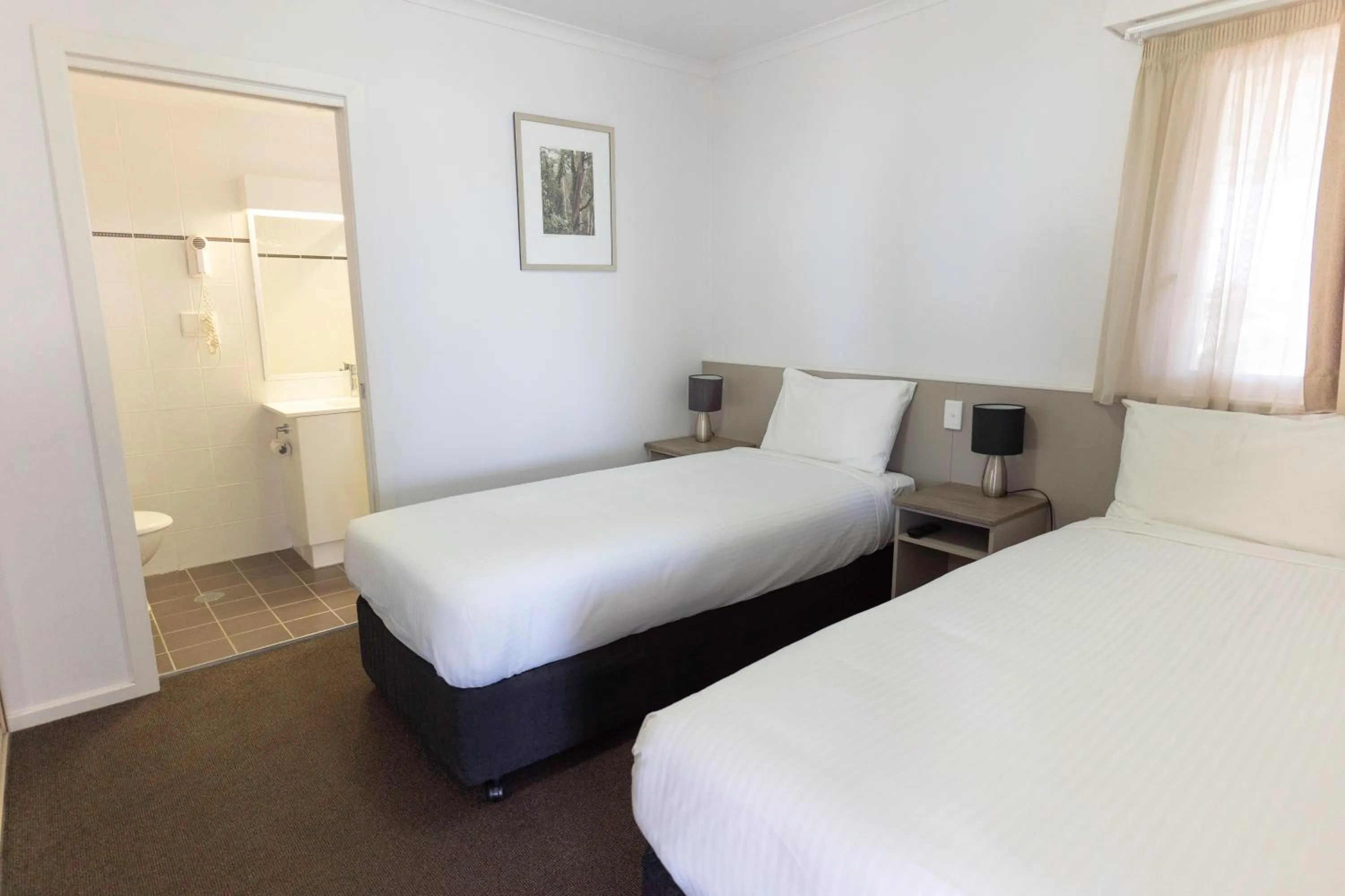 Bed in Amooran Oceanside Apartments and Motel