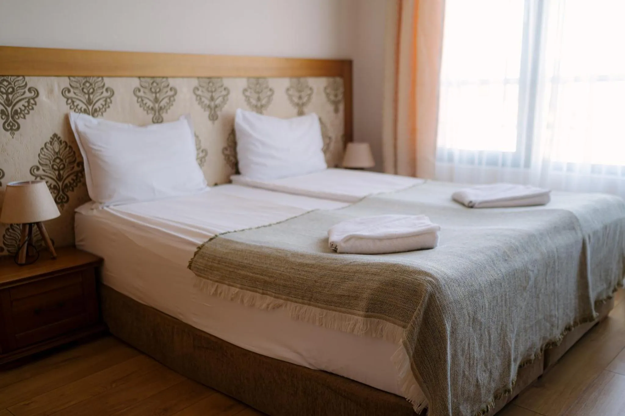 Bed in Cornelia Deluxe Residence