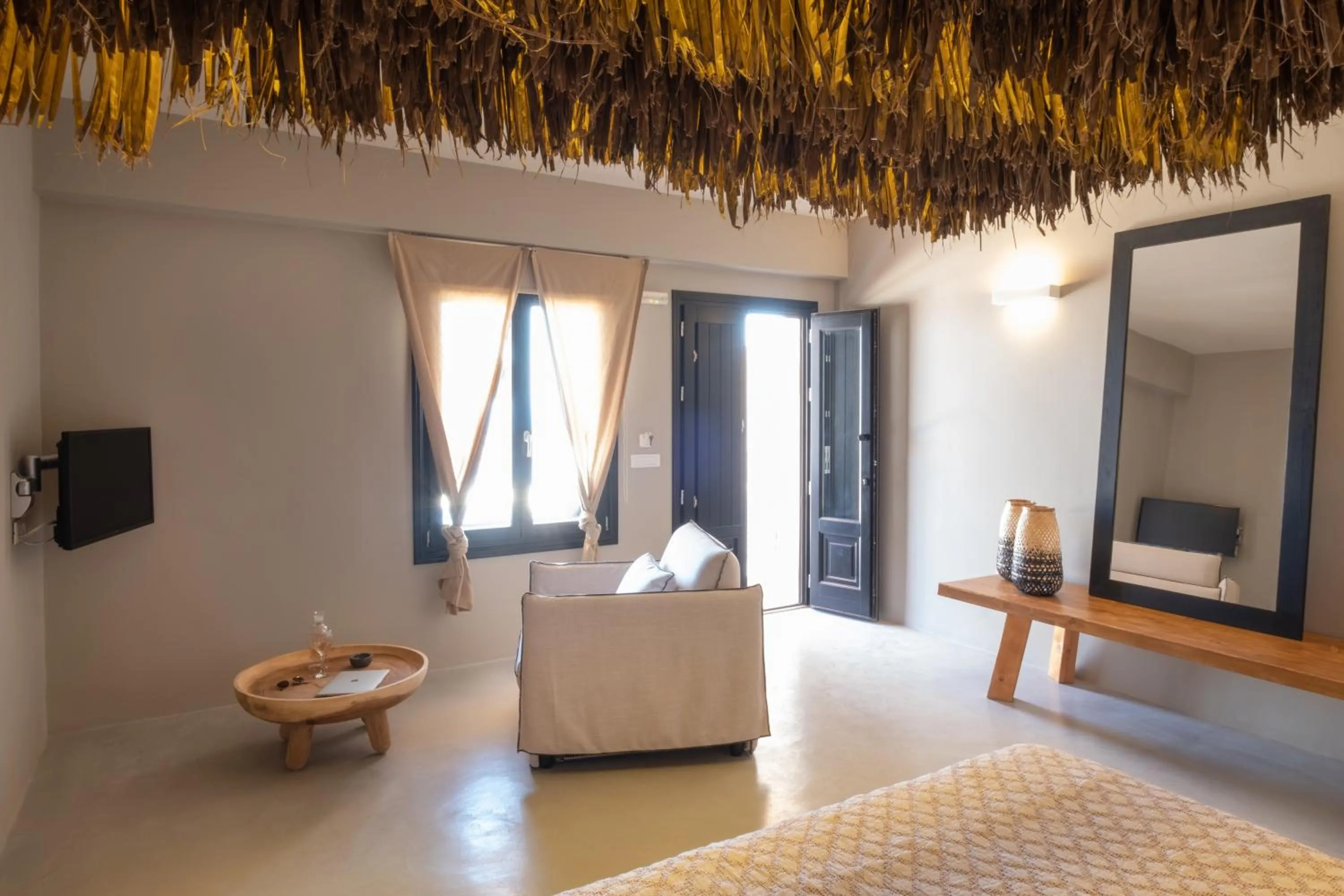 Seating area in IfestAu.4 Suites