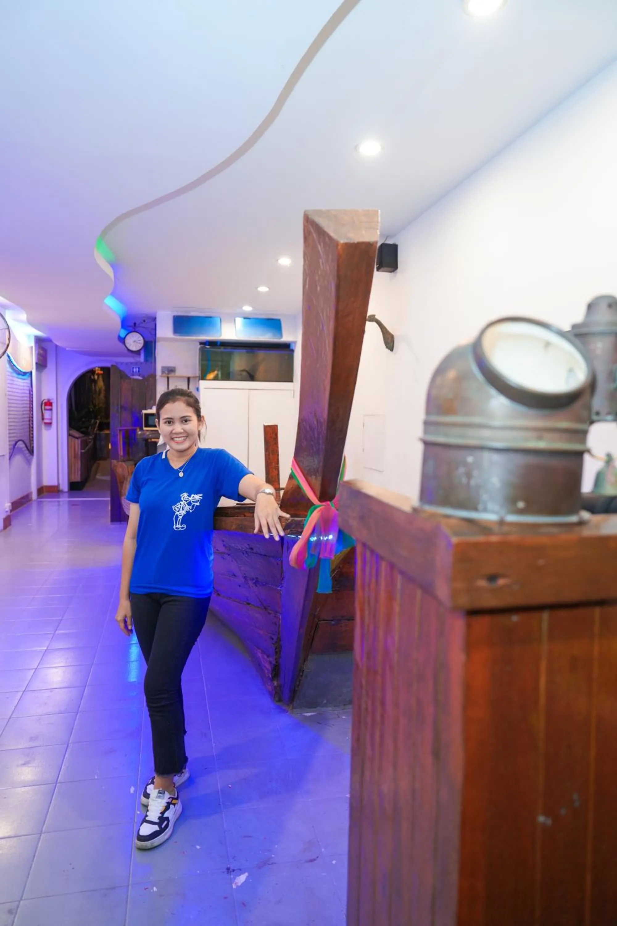 Communal lounge/ TV room in Baan Kamala Backpacker