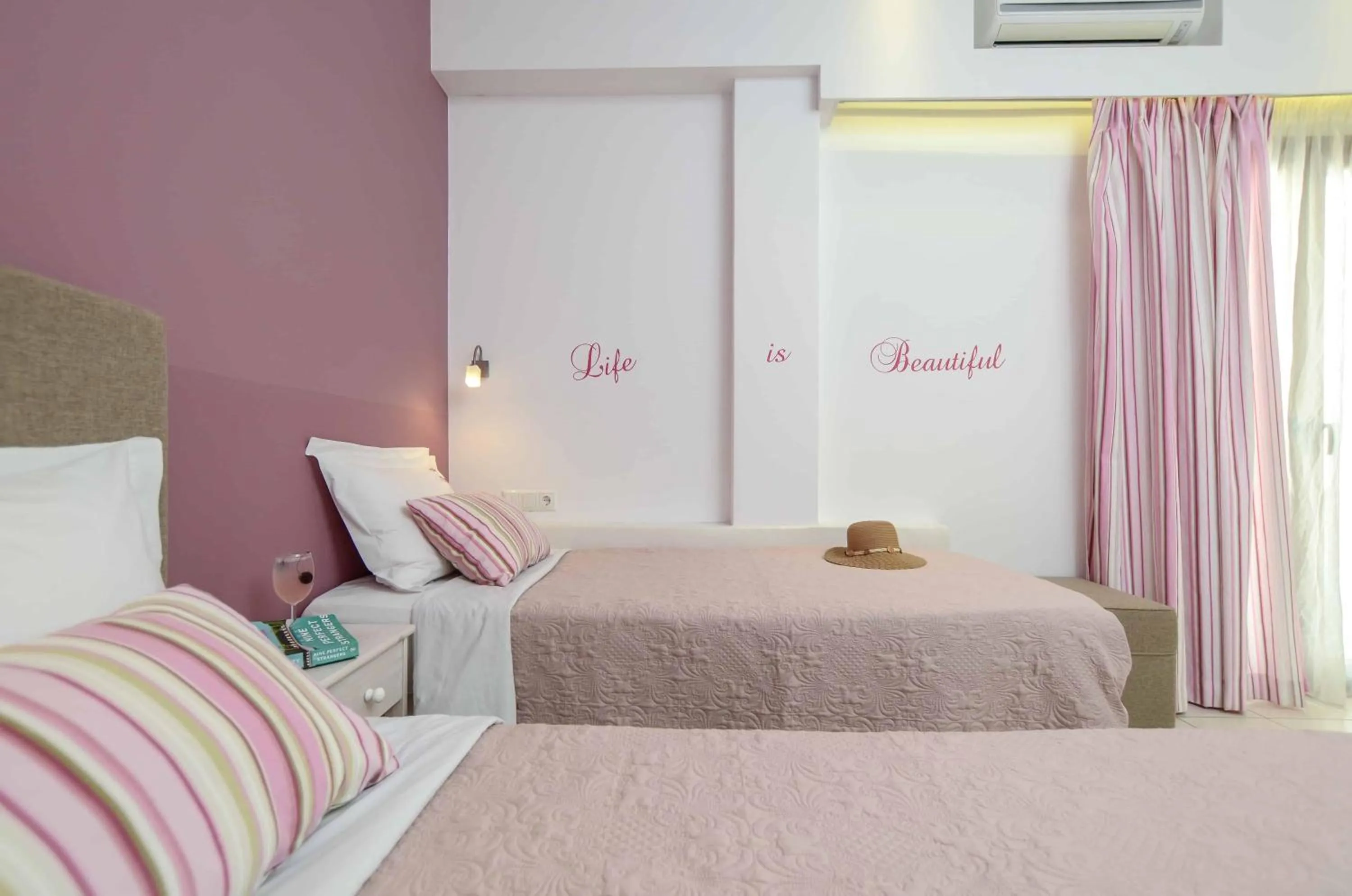 Bed in Panormos Hotel and Studios