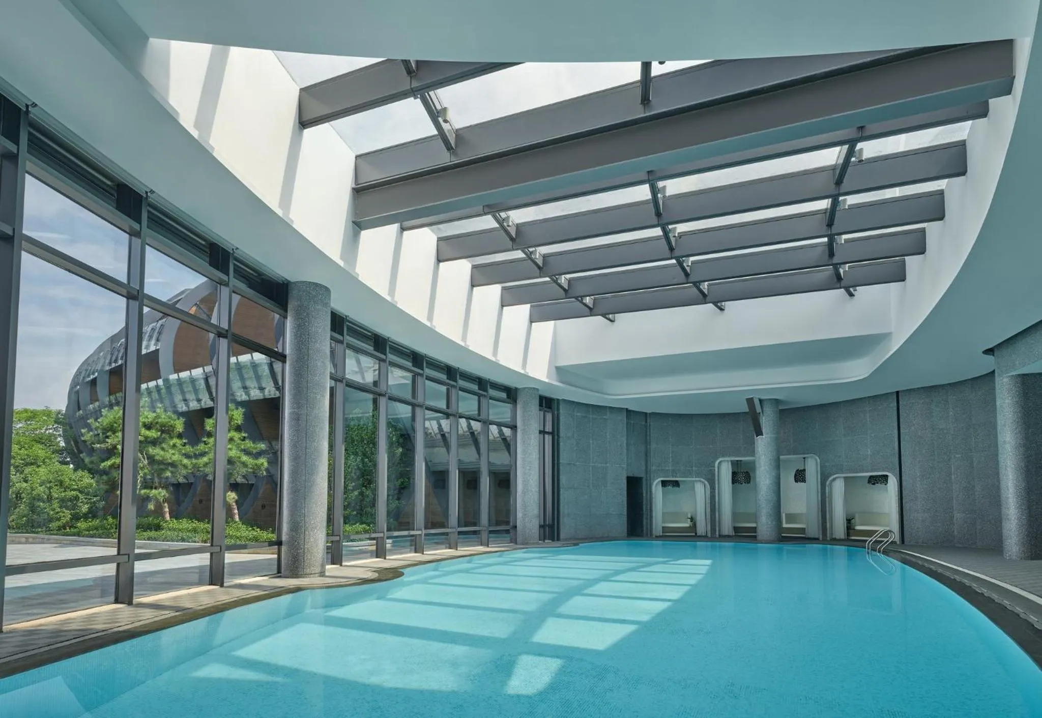 Swimming pool in InterContinental Shanghai Harbour City by IHG