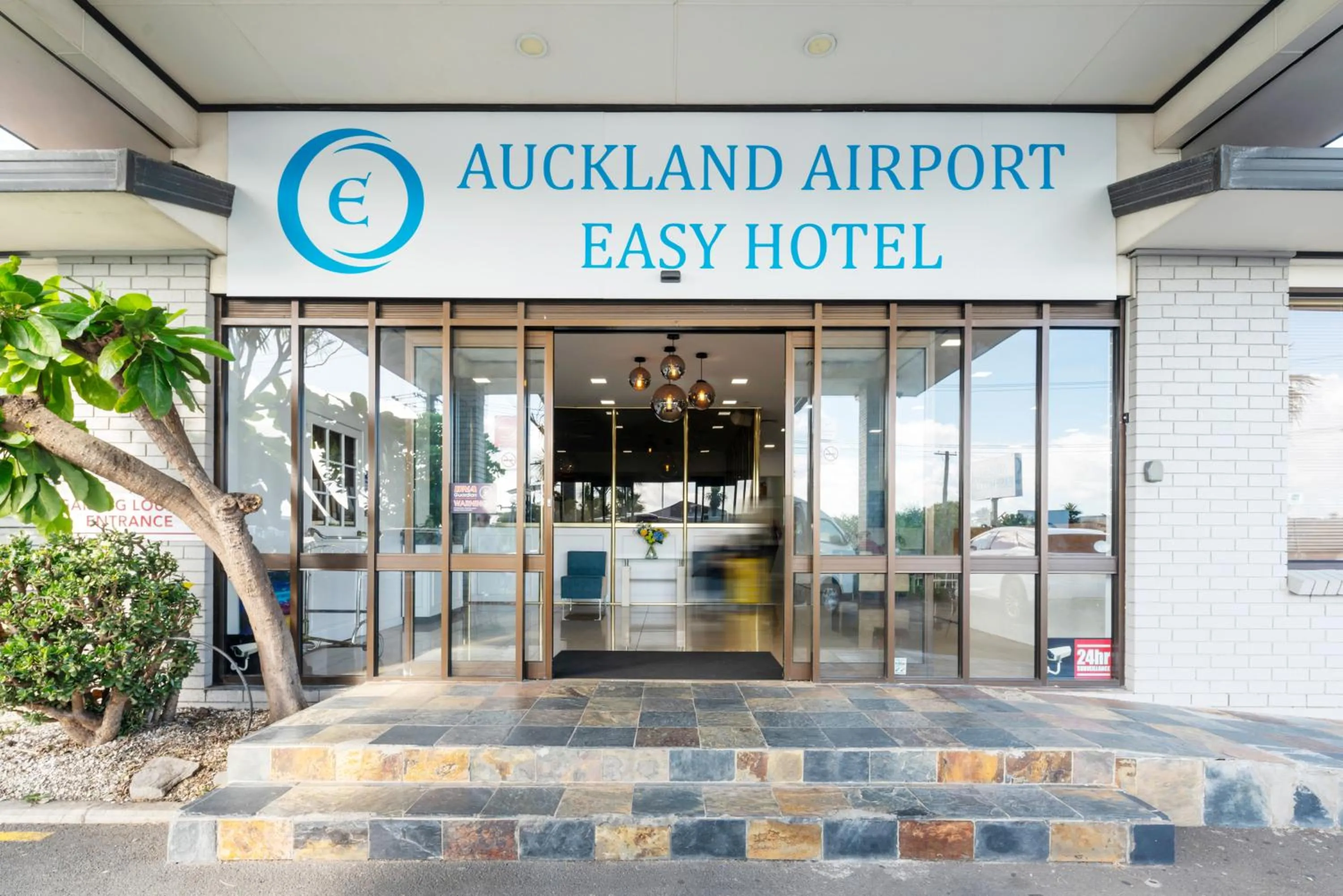 Property logo or sign in Auckland Airport Easy Hotel