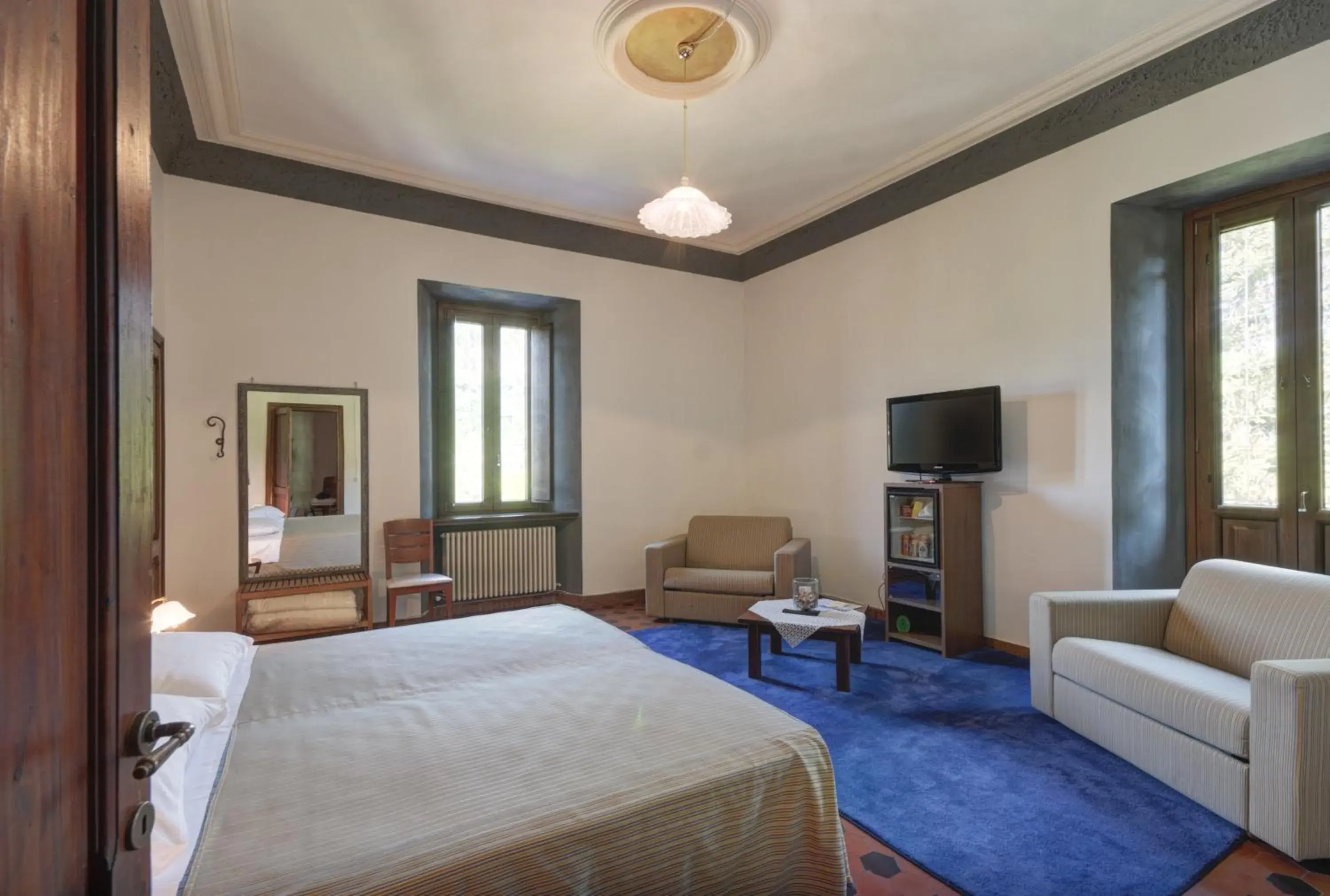 Superior Quadruple Room in Raffaello Residence Superior Quadruple Room in Raffaello Residence