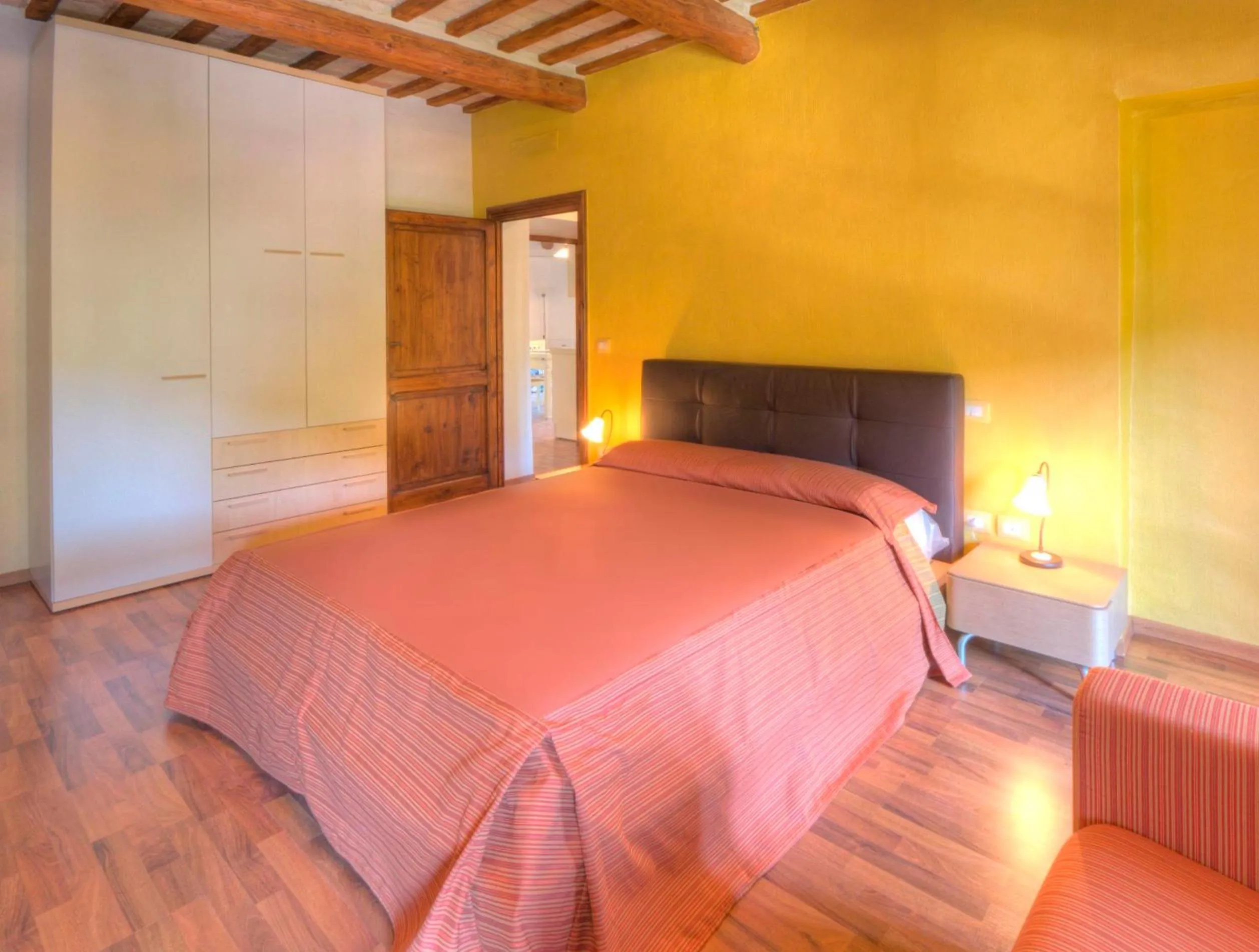 Photo of the whole room, Bed in Raffaello Residence