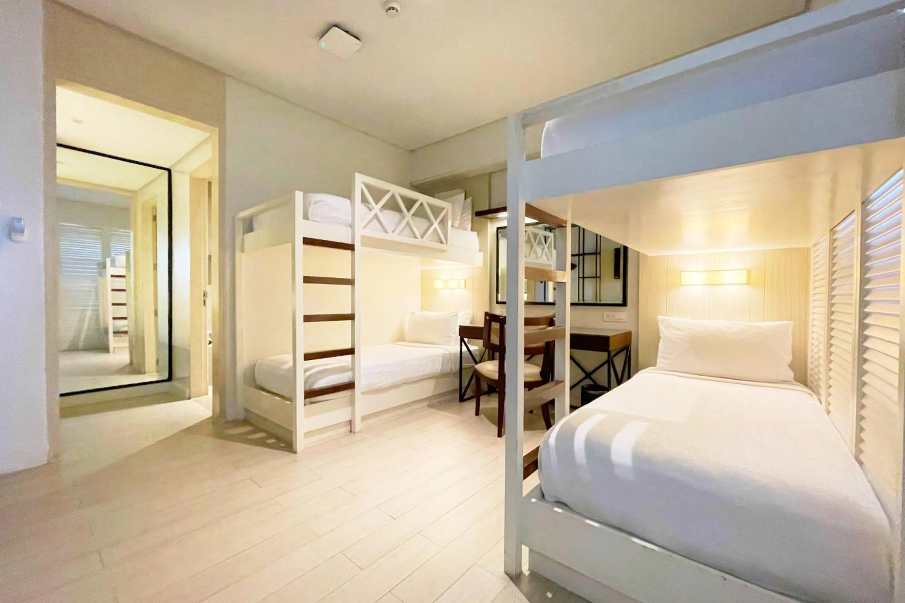 Bed in Mella Hotel Manila near NAIA Airport