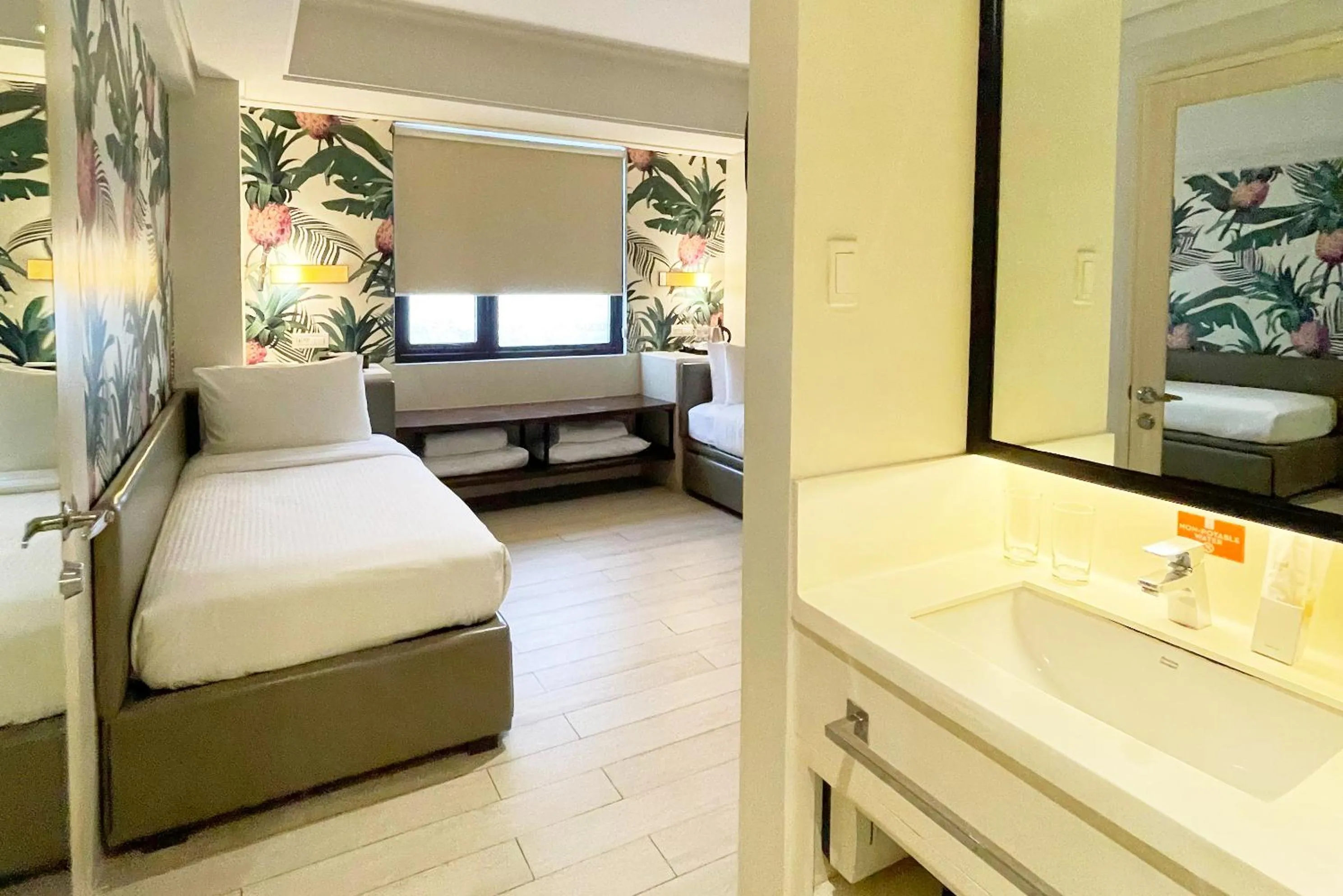 Bed in Mella Hotel Manila near NAIA Airport