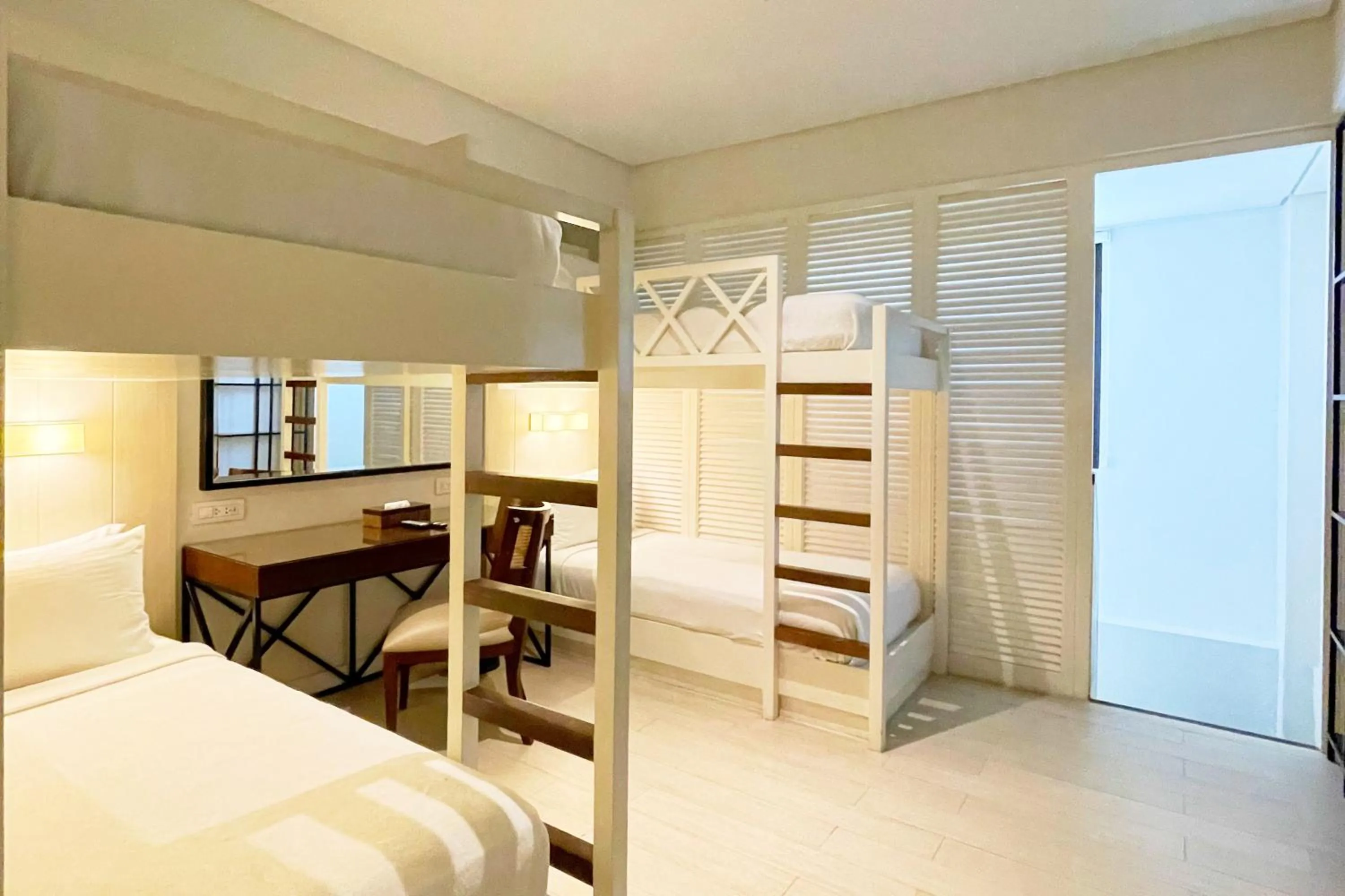 Bed in Mella Hotel Manila near NAIA Airport