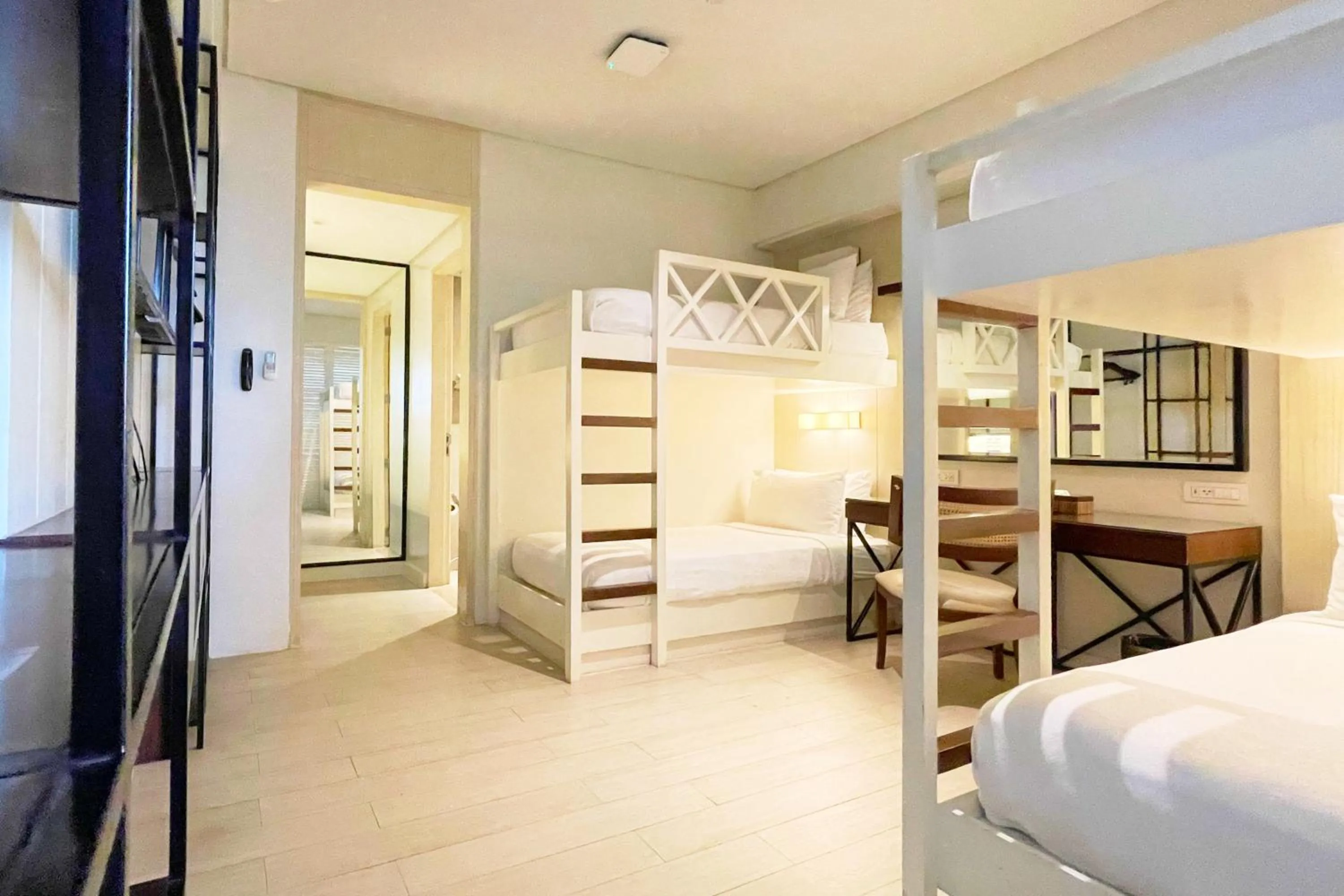 Bed in Mella Hotel Manila near NAIA Airport