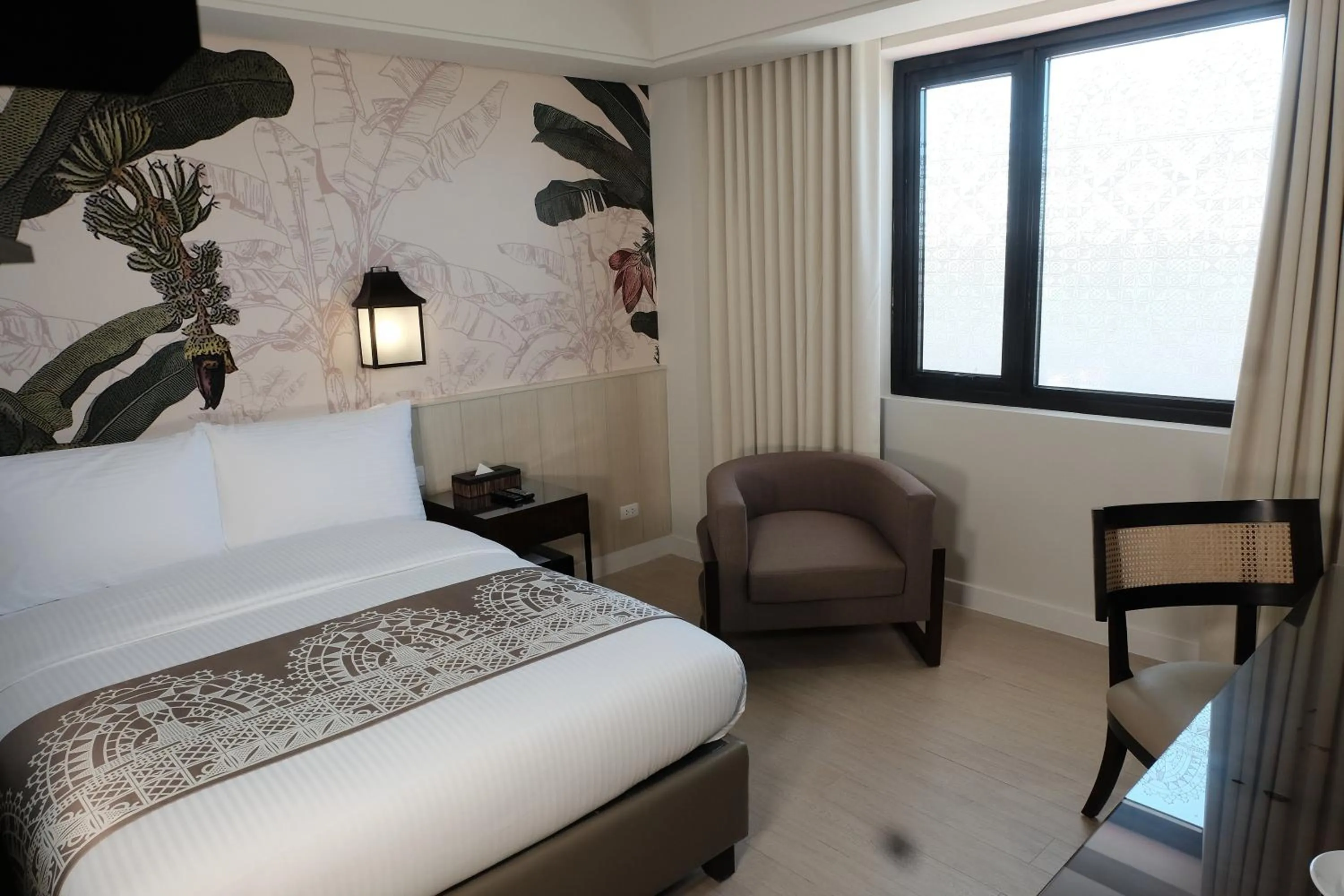 Bed in Mella Hotel Manila near NAIA Airport