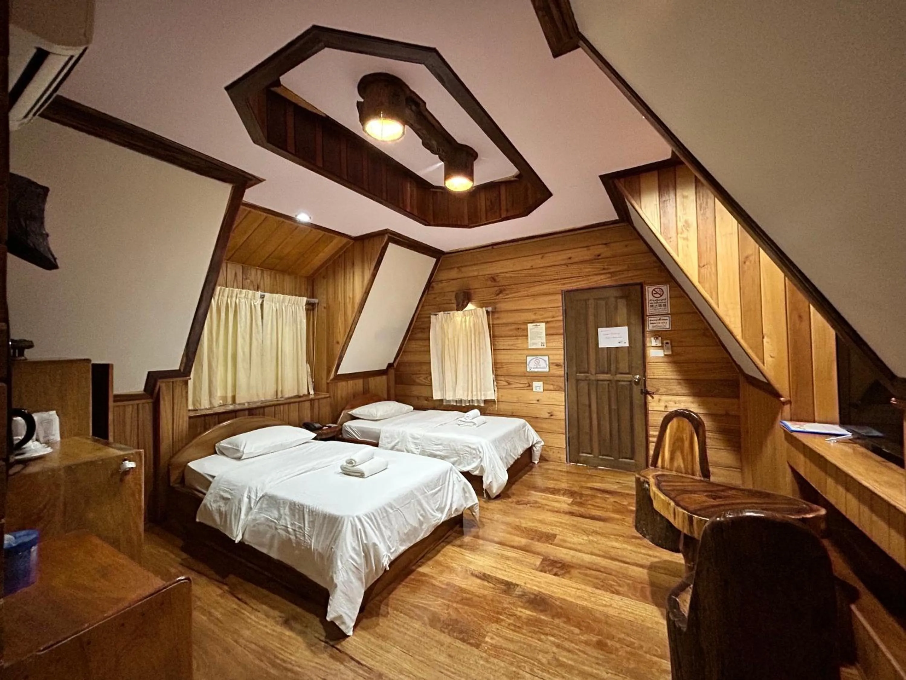 Bed in Magmai HomestayTak