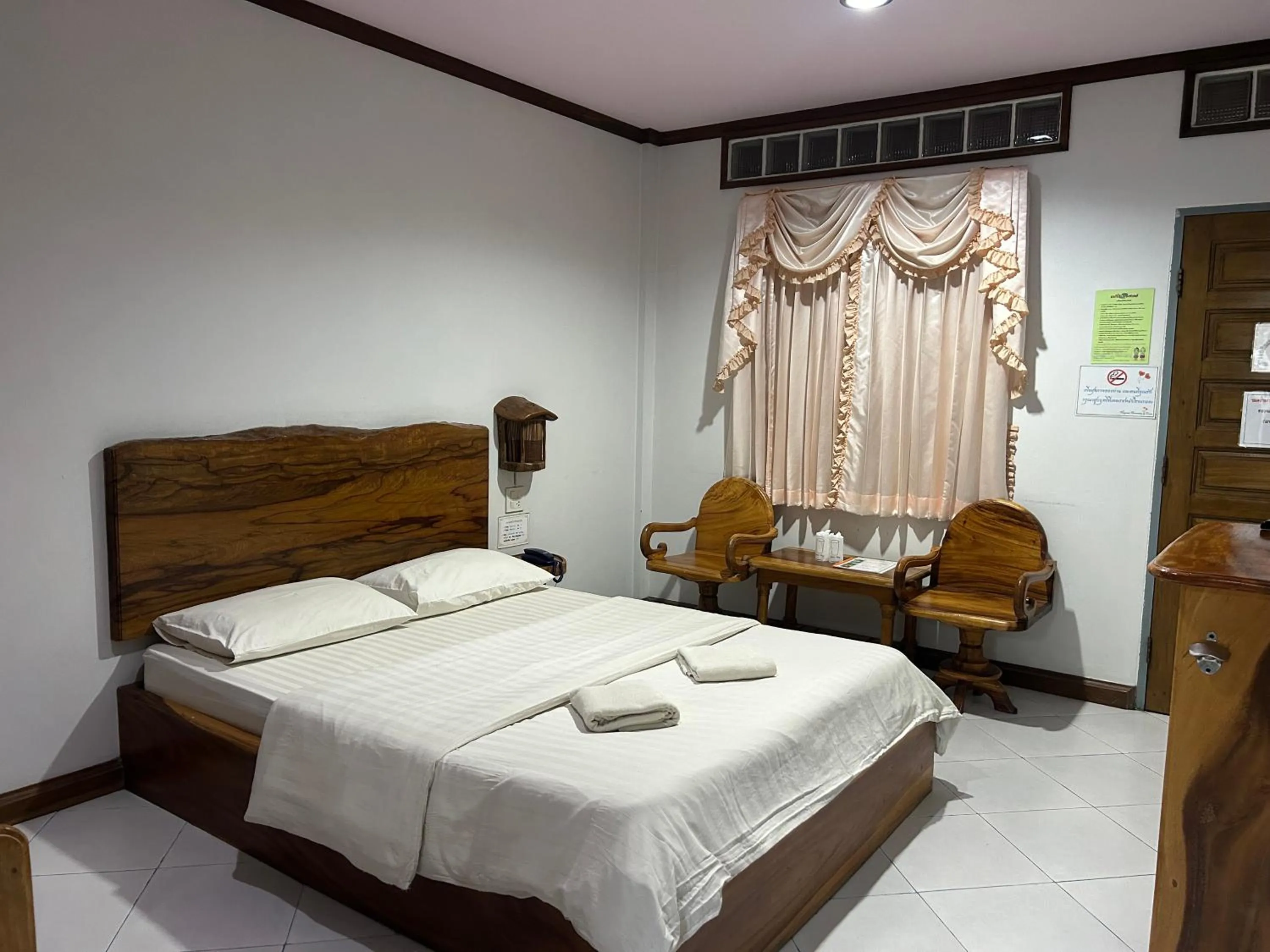 Bed in Magmai HomestayTak