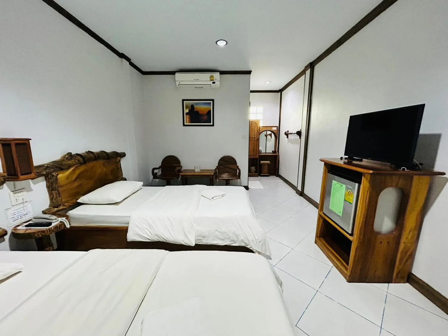 Bed in Magmai Hotel and Resort