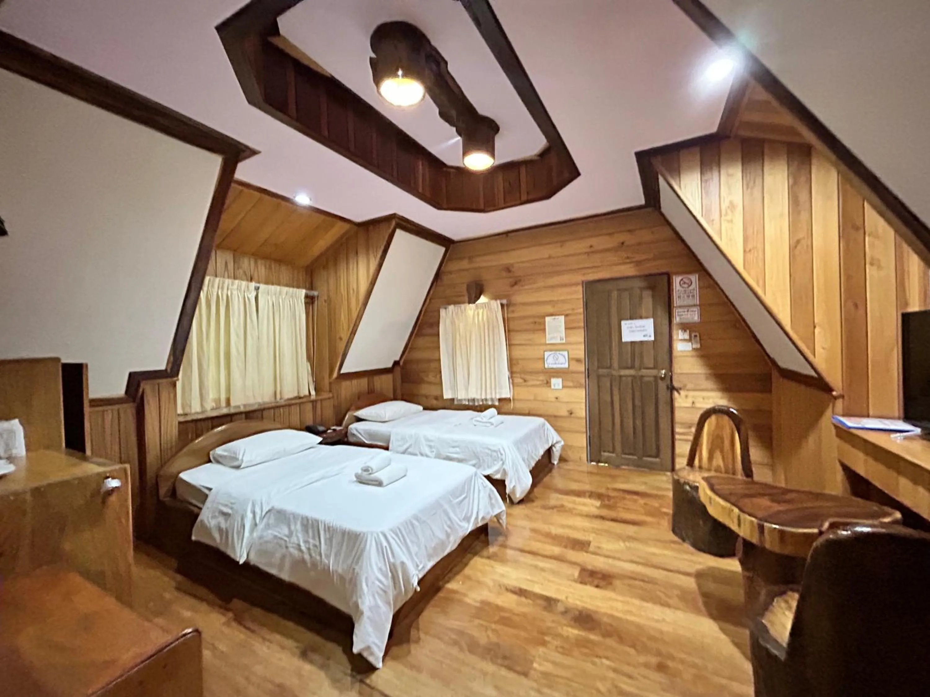 Bed in Magmai HomestayTak