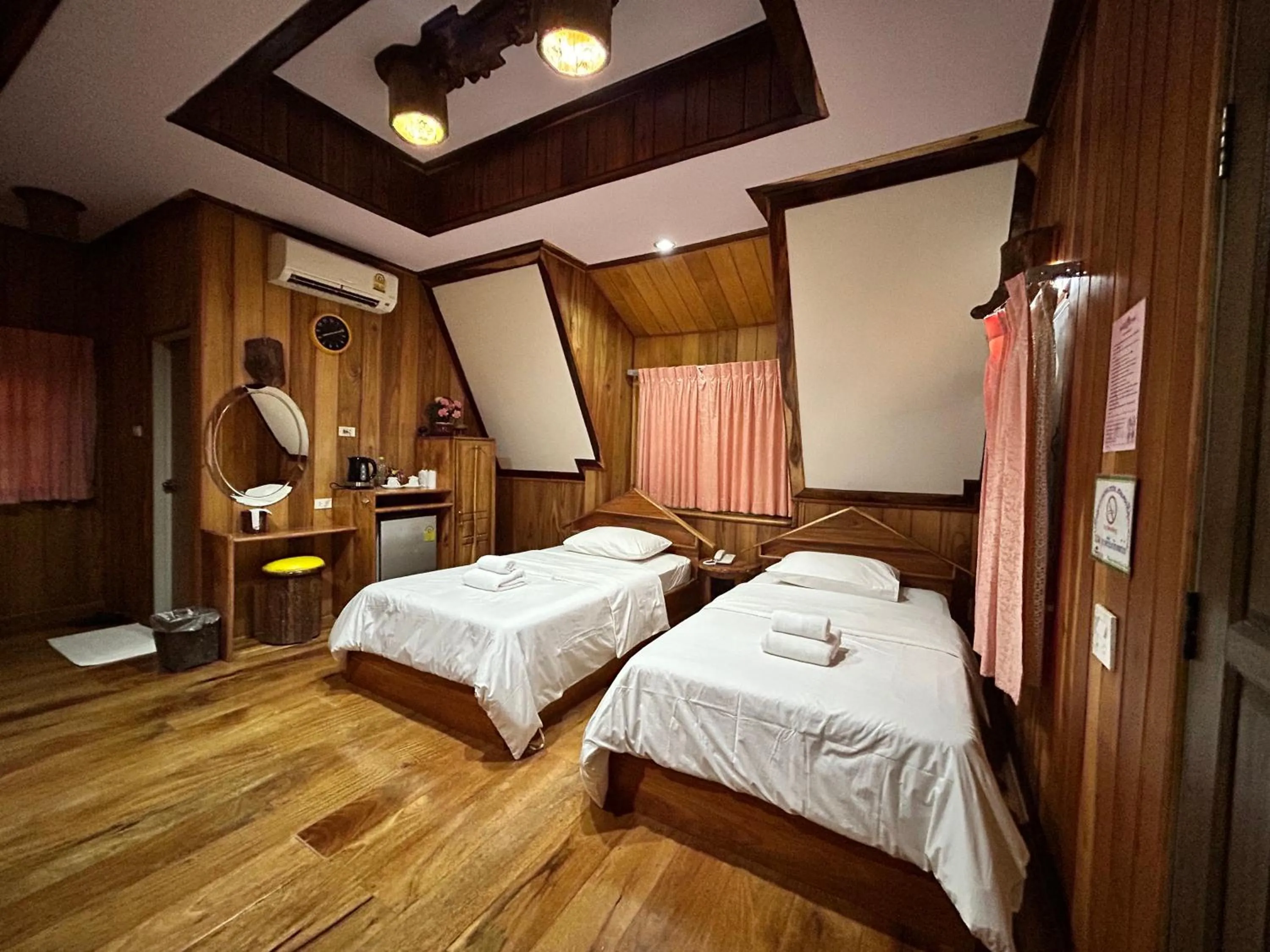 Bed in Magmai HomestayTak