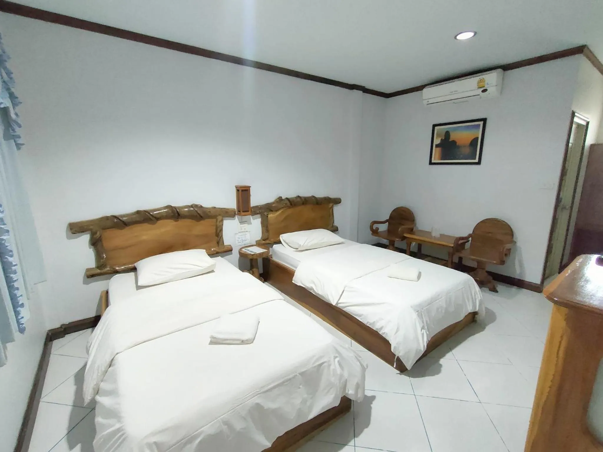 Bed in Magmai Hotel and Resort
