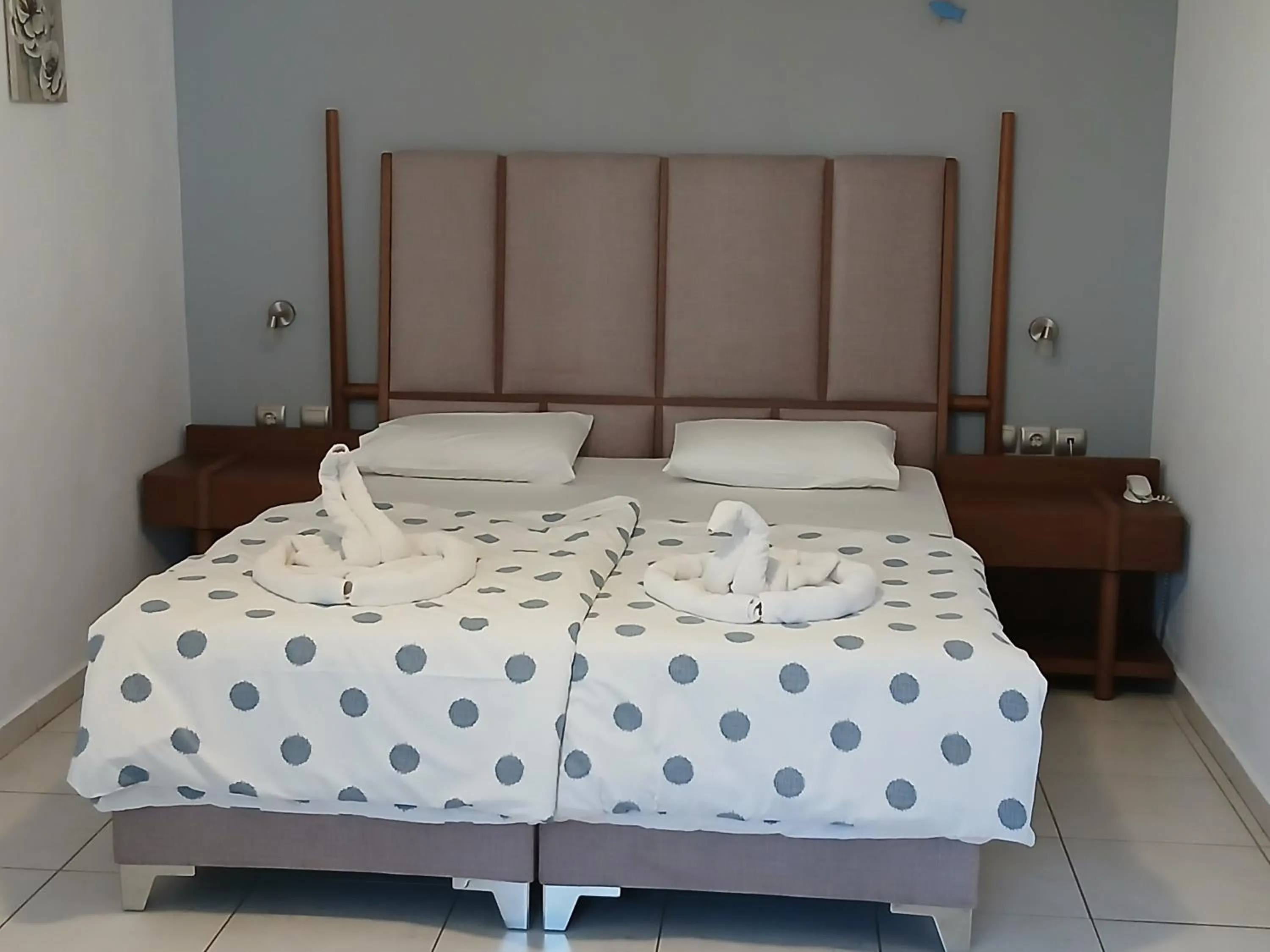 Bed in Amari Hotel