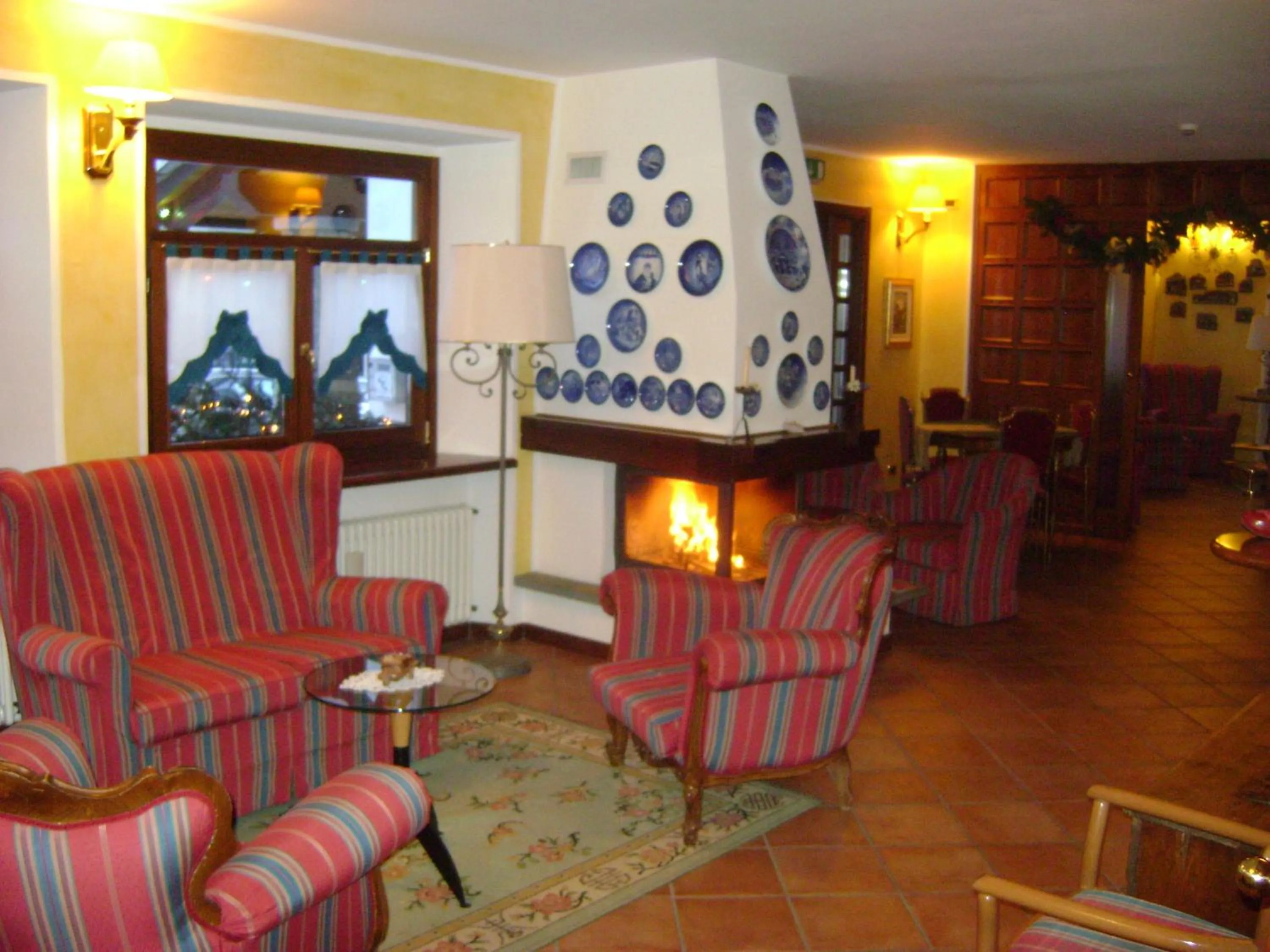 Communal lounge/ TV room in Hotel Edelweiss