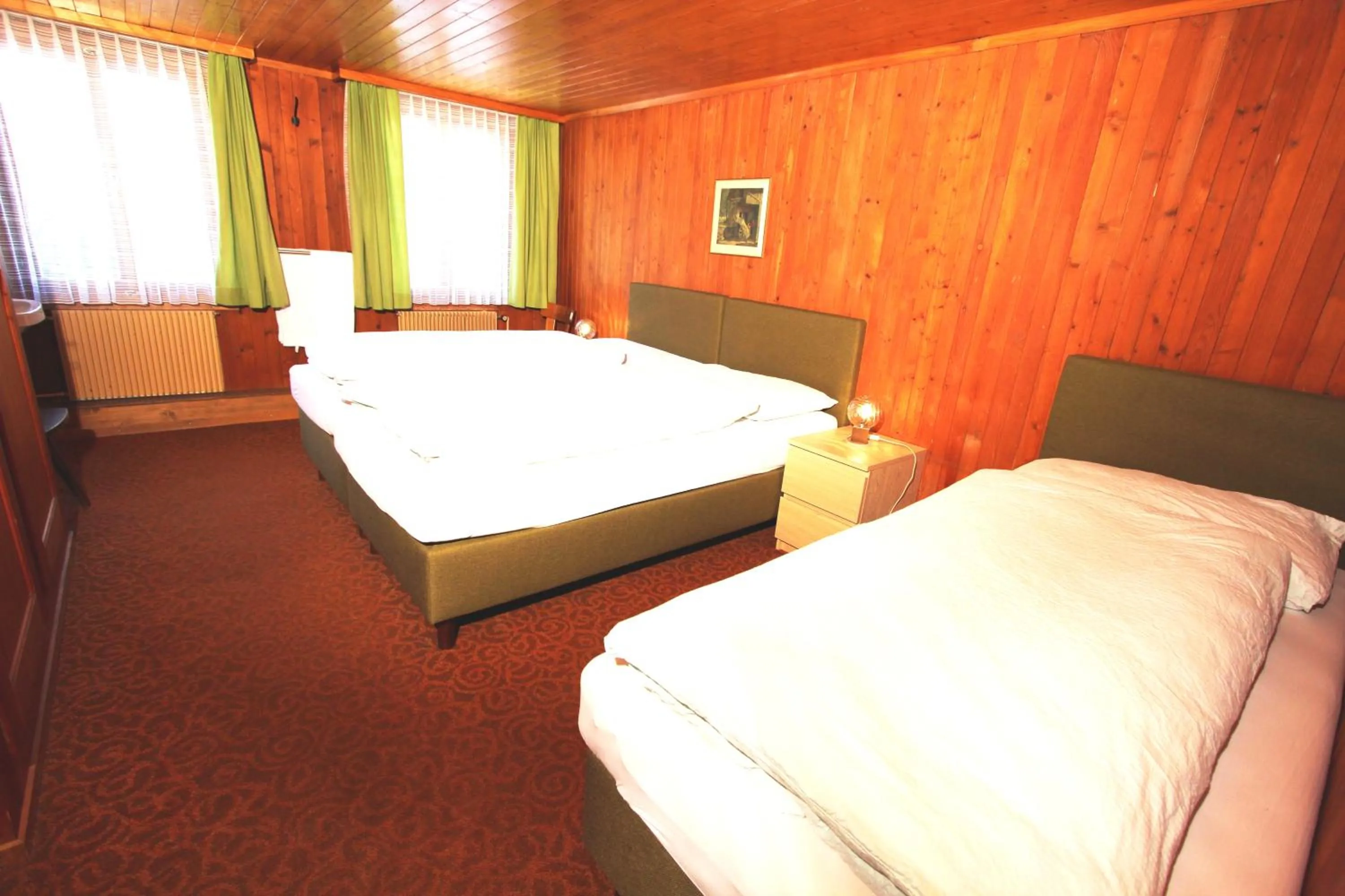 Photo of the whole room, Bed in Hotel-Restaurant Alpina