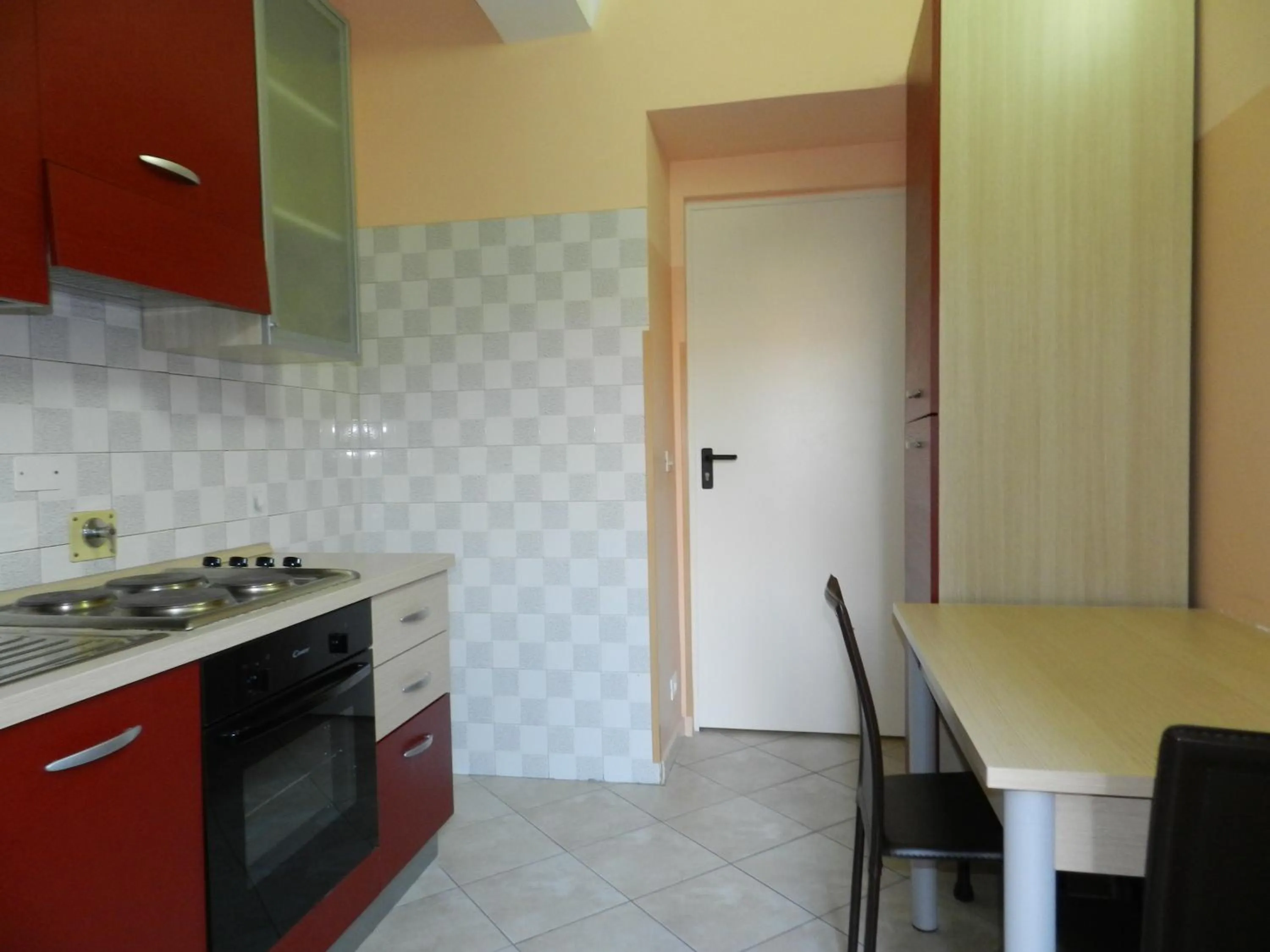 Kitchen or kitchenette in Appartamenti Valdocco