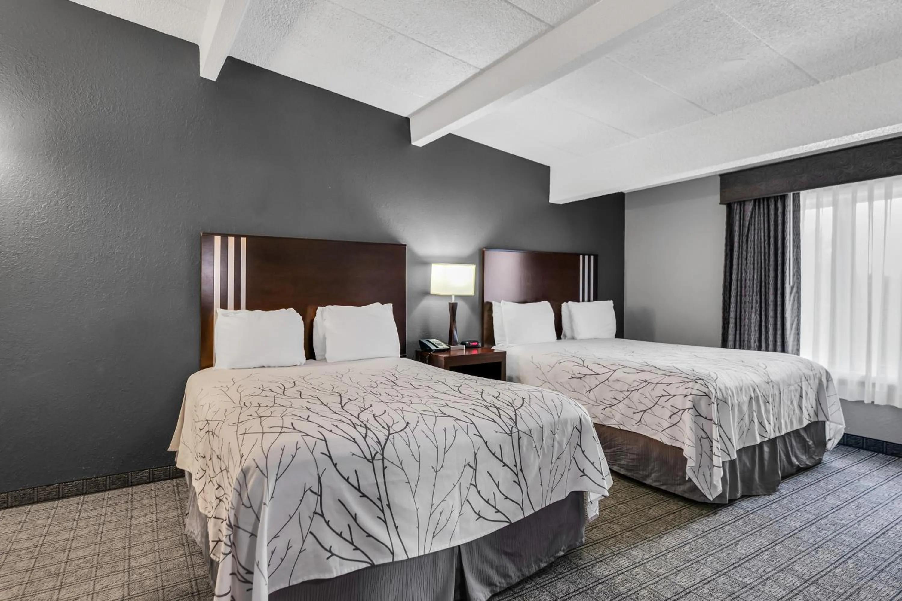 Bedroom, Bed in Eastlake Suites Hotel & Conference Center By OYO Urbana