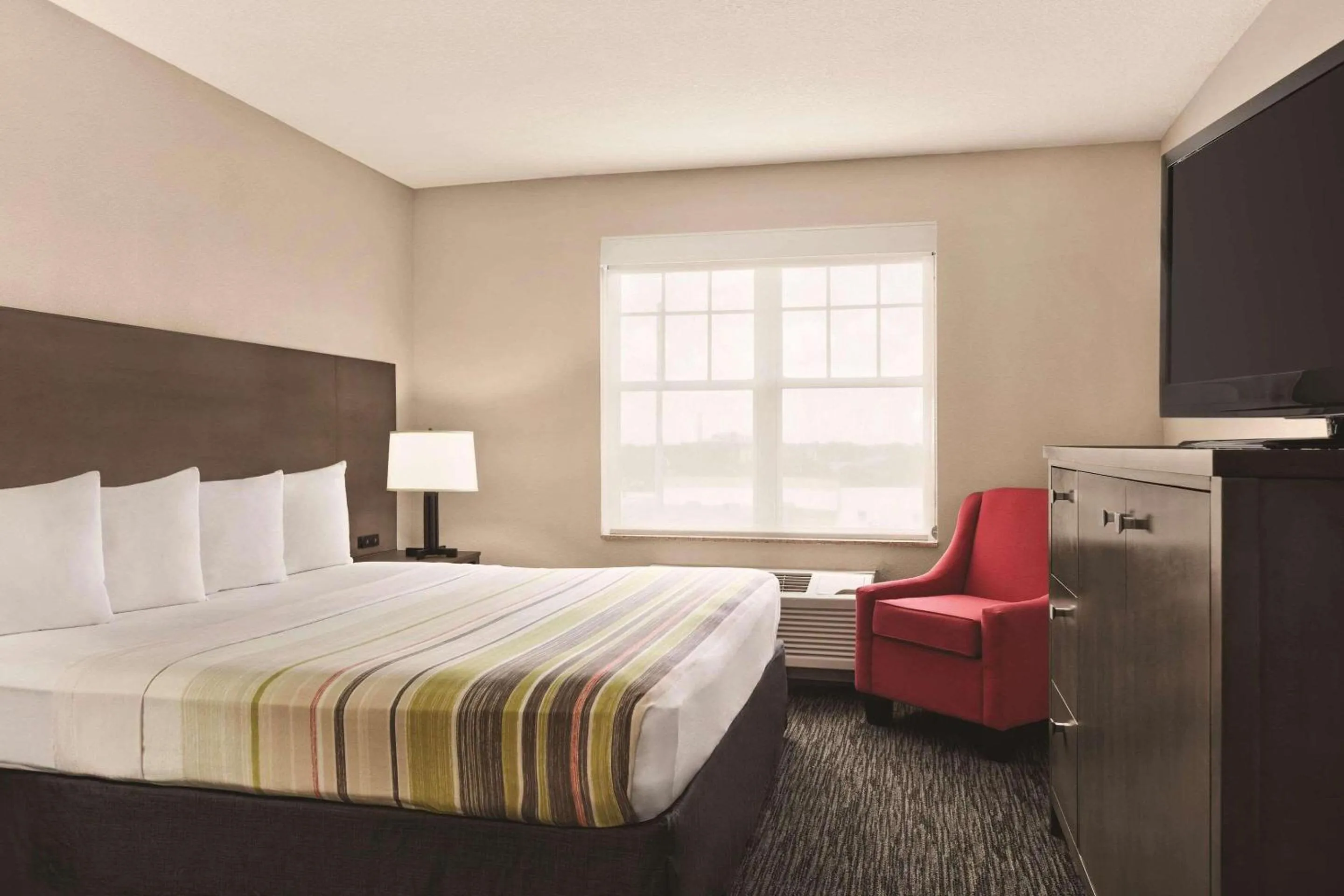 Bedroom, Bed in Country Inn & Suites by Radisson, Tampa-Brandon, FL