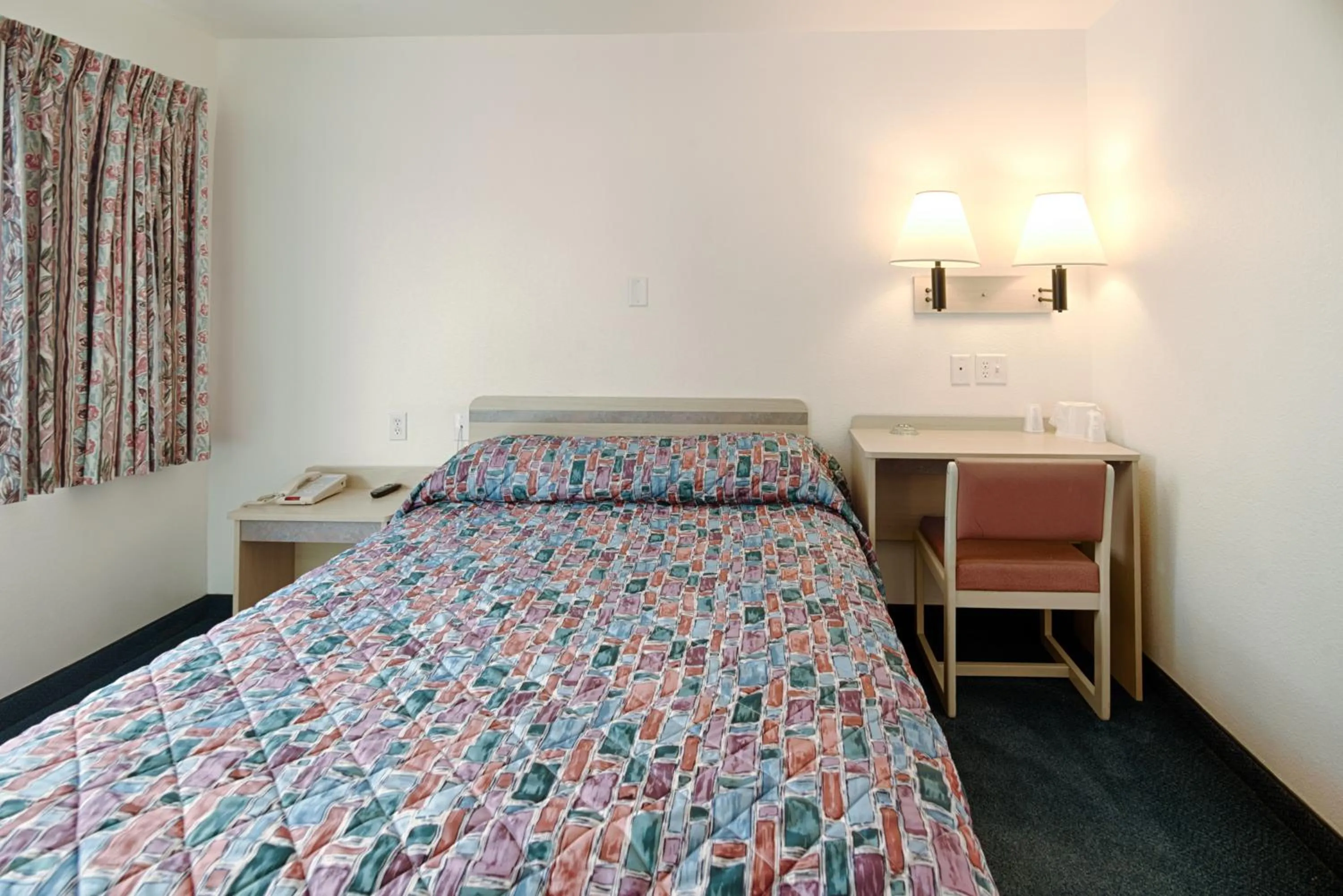 Seating area, Bed in Motel 6-Winnemucca, NV