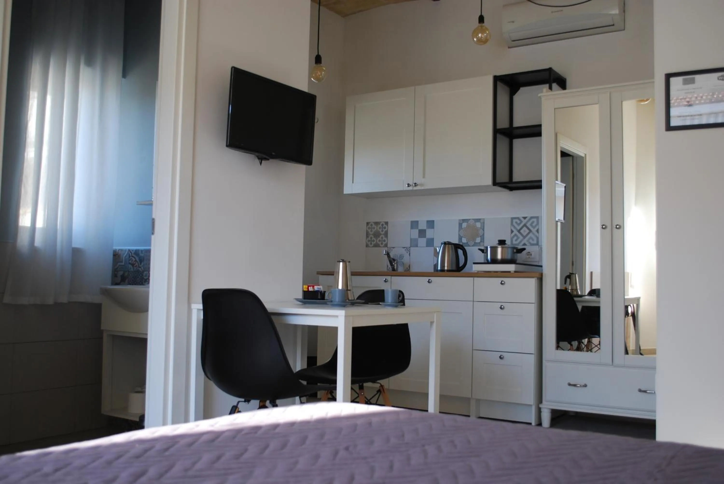 Kitchen or kitchenette in Al Faro Bianco B&B e Residence con parcheggio